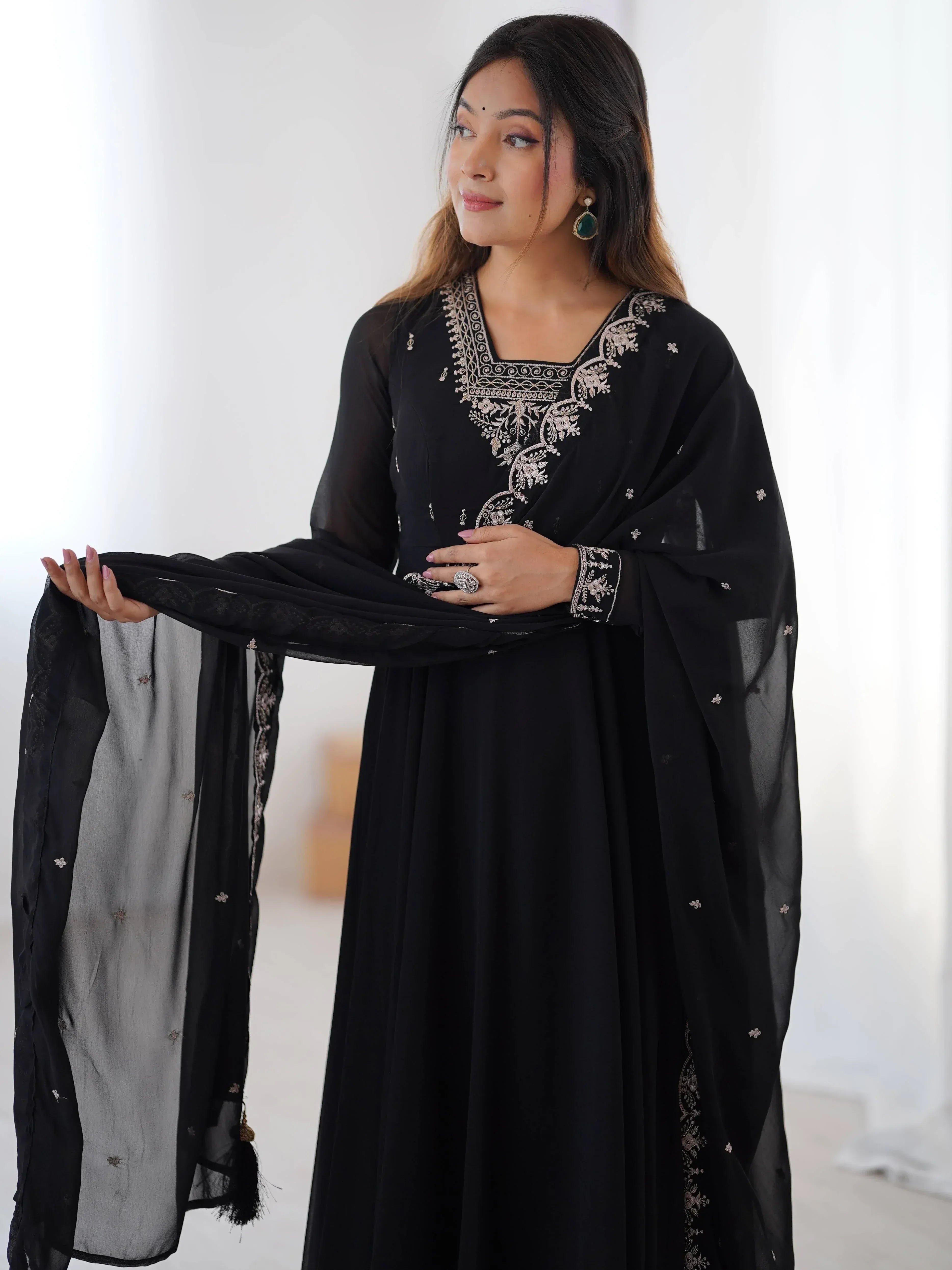 Black embroidered ethnic gown with sheer dupatta, perfect for Indian occasions