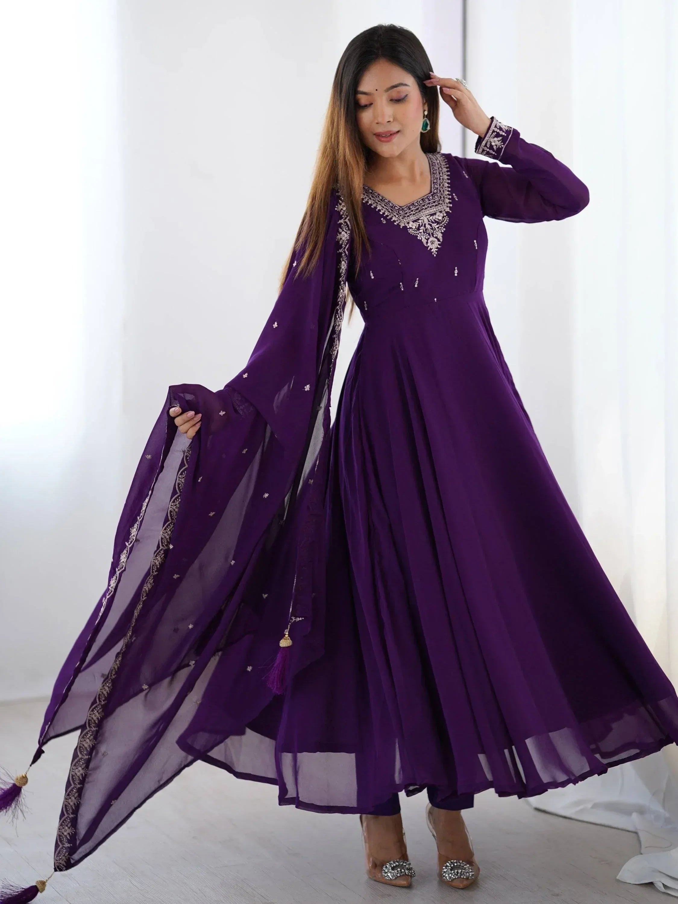 Purple ethnic gown with embroidery and matching dupatta, ideal for Indian occasions