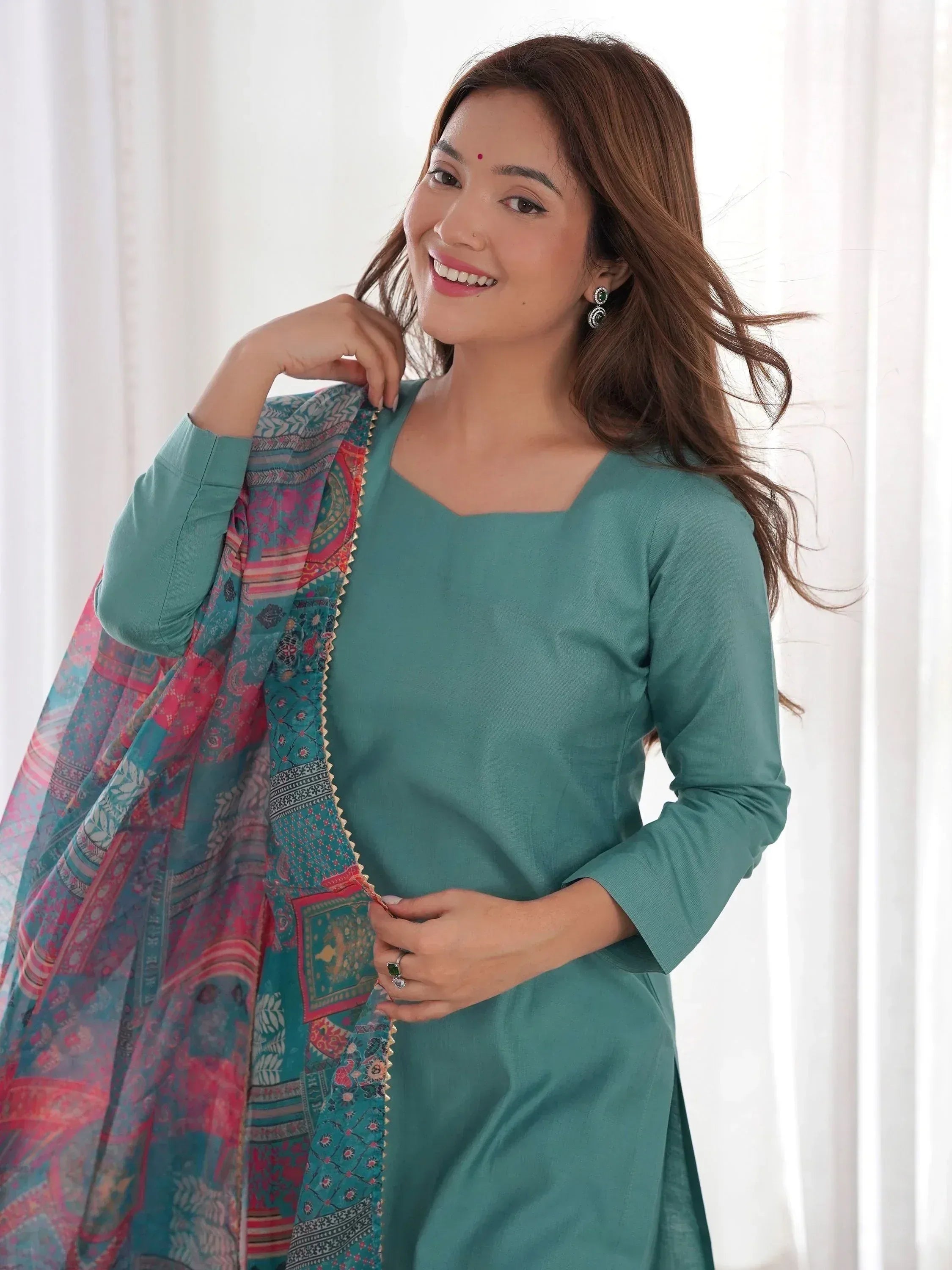 Woman in teal ethnic kurta with colorful printed dupatta, Indian designer wear