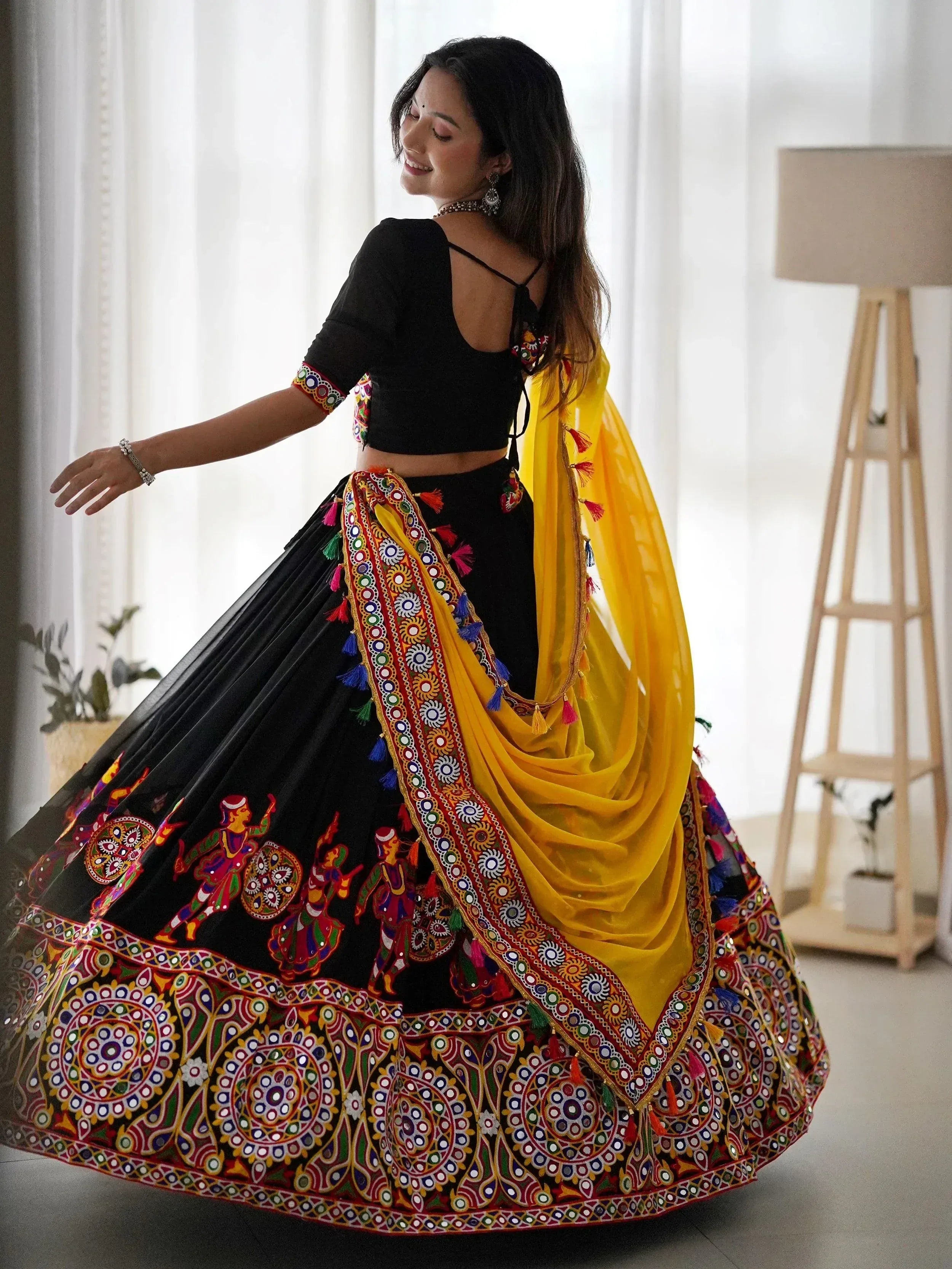 Black embroidered lehenga choli with yellow dupatta, Indian ethnic wear for women