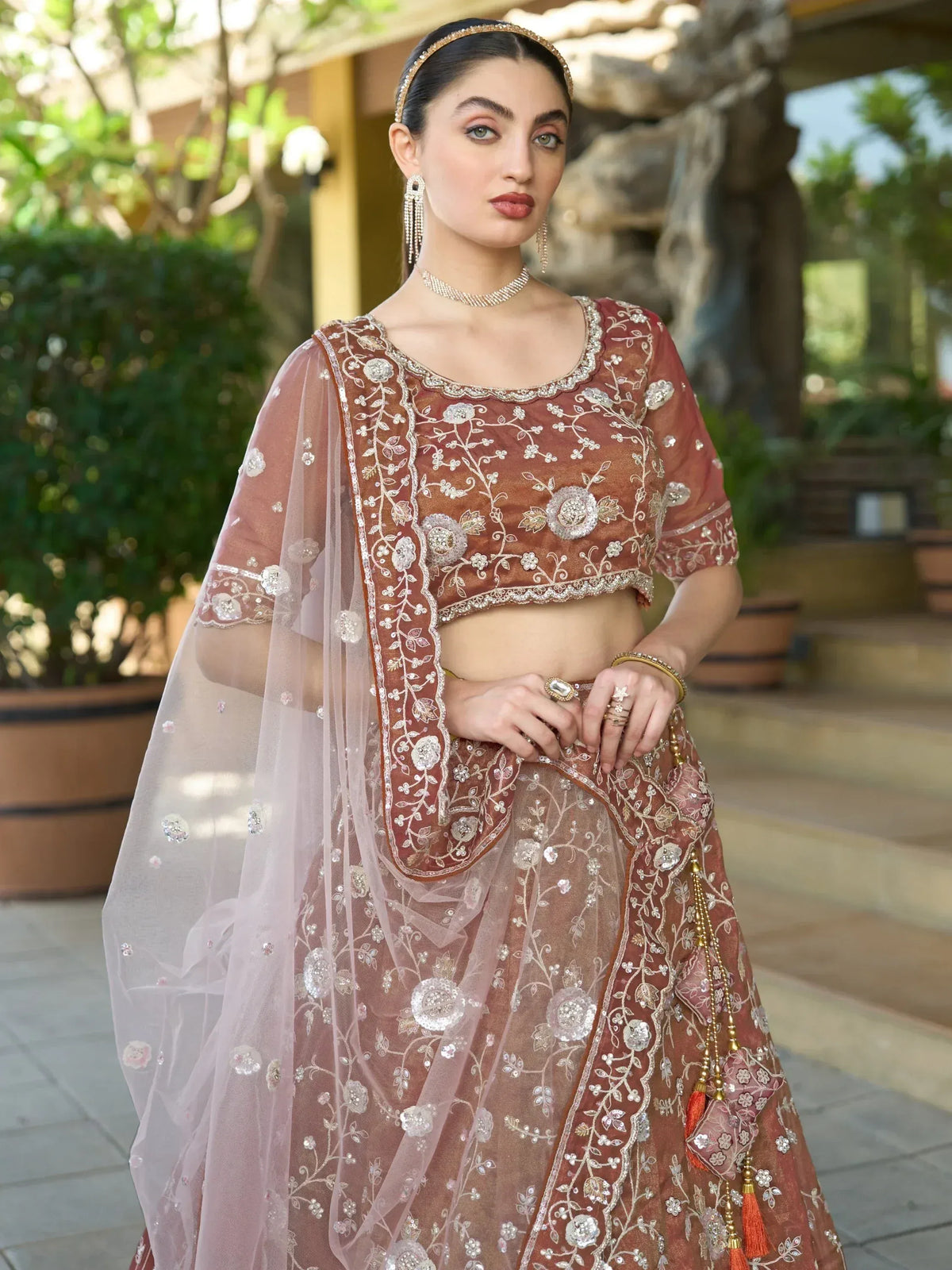 Elegant Indian lehenga choli with floral embroidery, perfect for weddings and festive occasions.