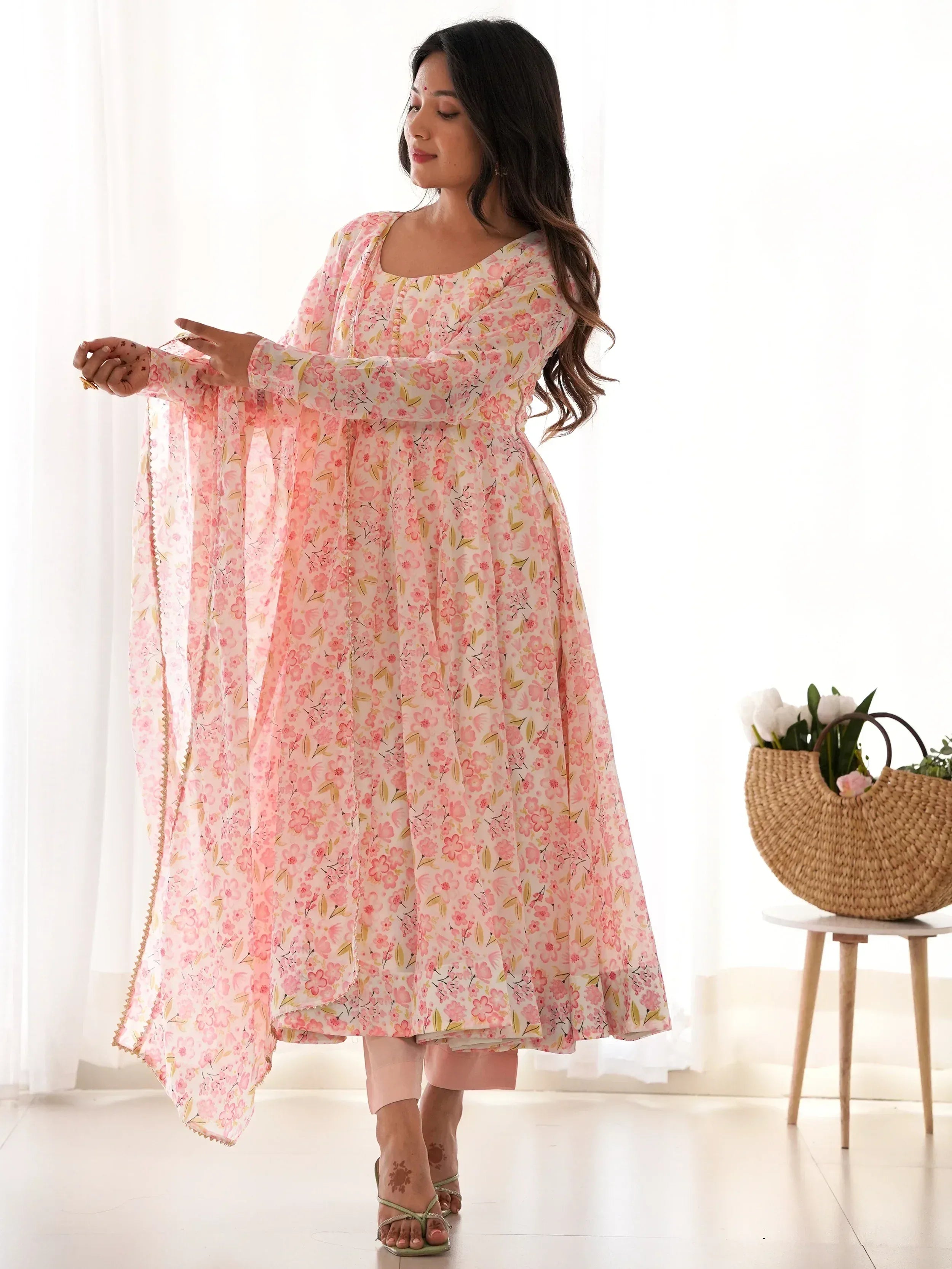 Pink floral printed ethnic kurta with matching dupatta, styled with palazzo pants for women