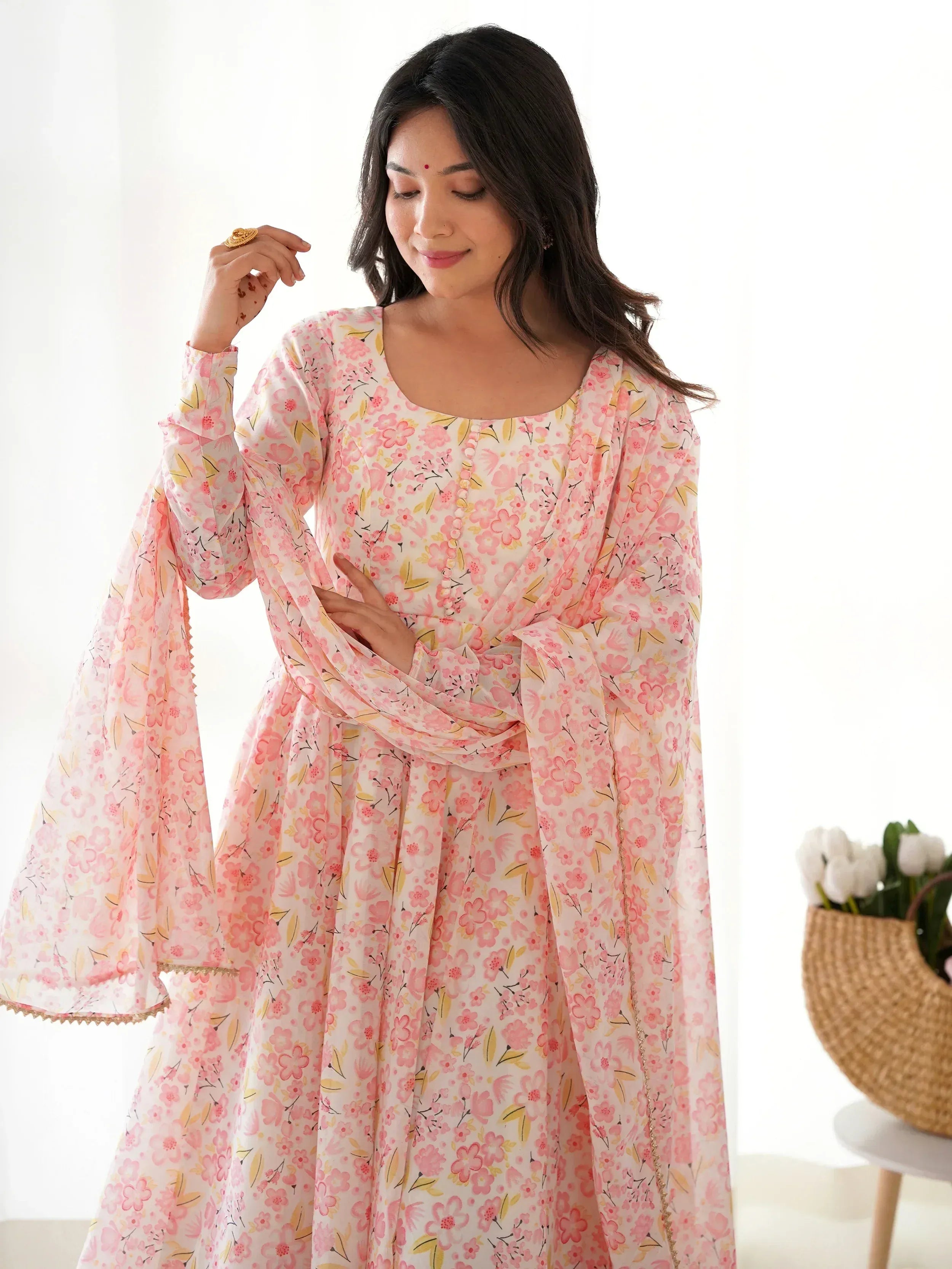 Pink floral print ethnic gown with bell sleeves, perfect for Indian occasions