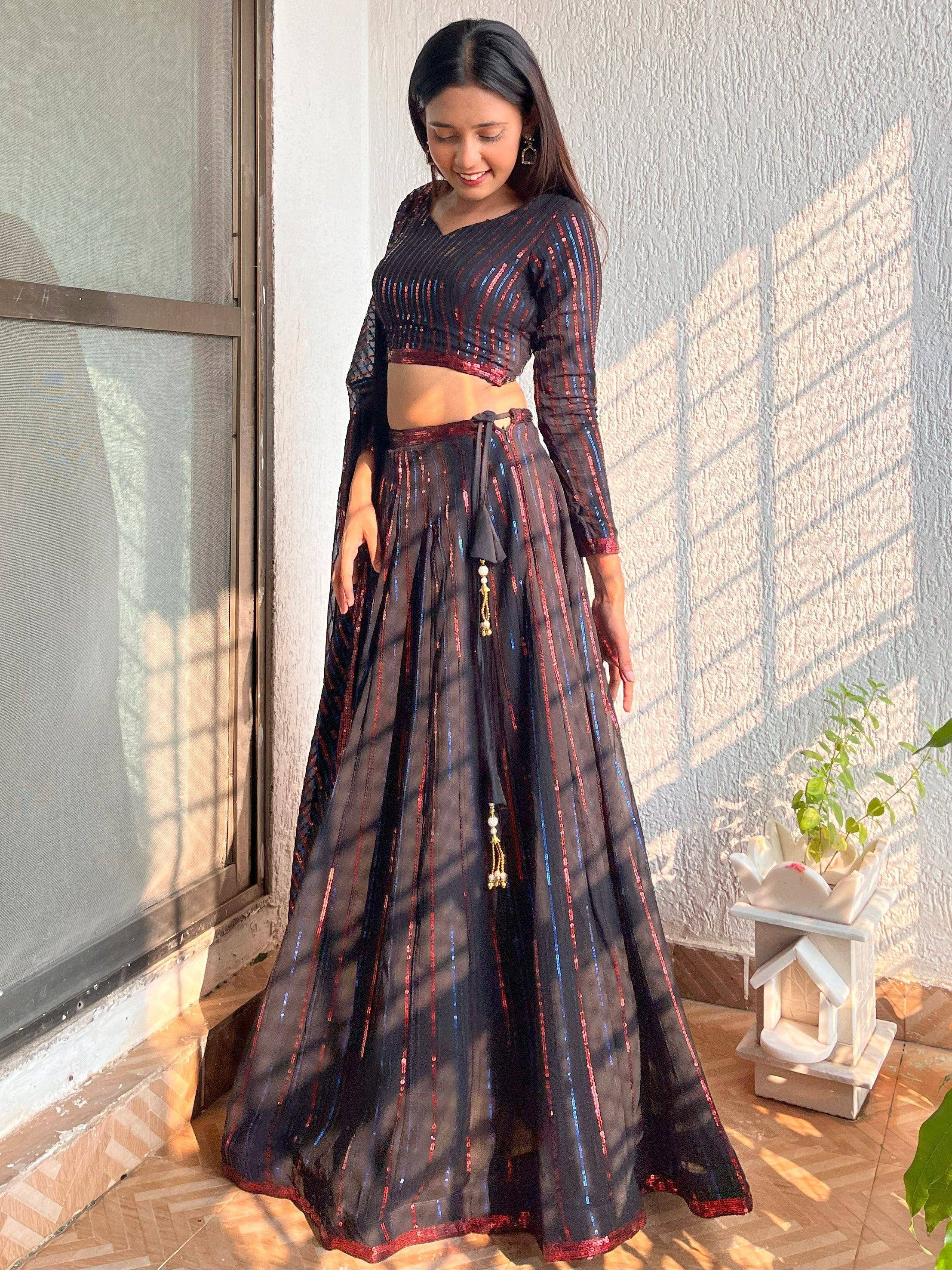 Black and red sequin lehenga choli with long sleeves, perfect for Indian ethnic wear events