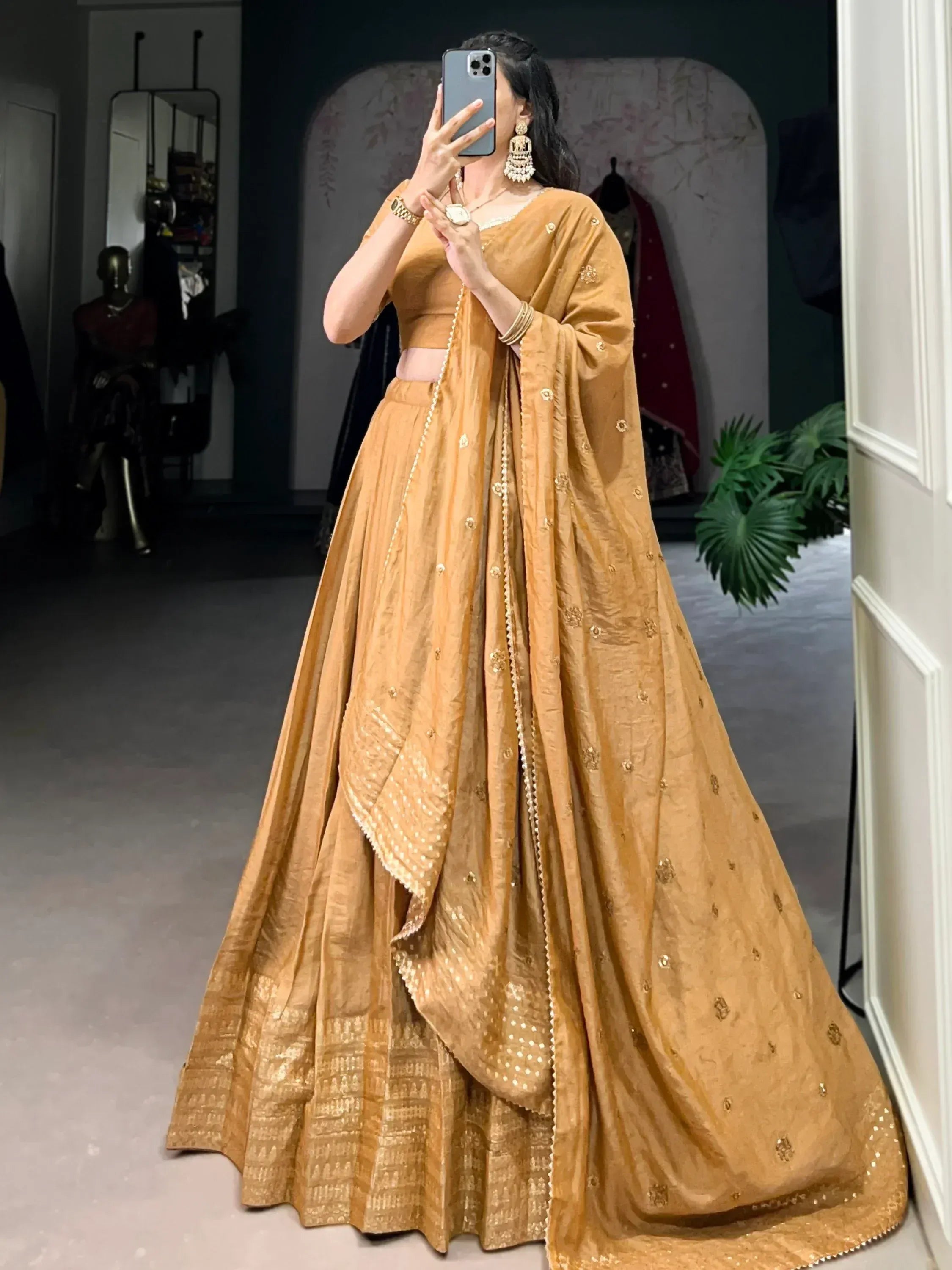 Mustard yellow designer lehenga choli with gold embroidery, perfect for Indian ethnic wear occasions