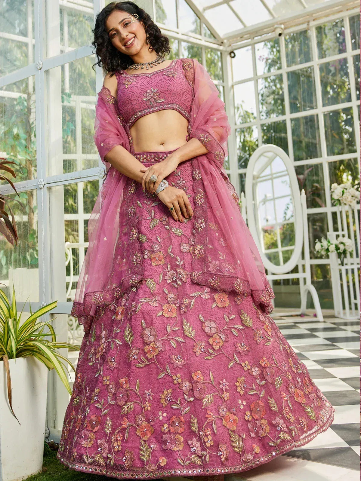 Pink floral embroidered lehenga choli with sheer dupatta, perfect for Indian ethnic occasions