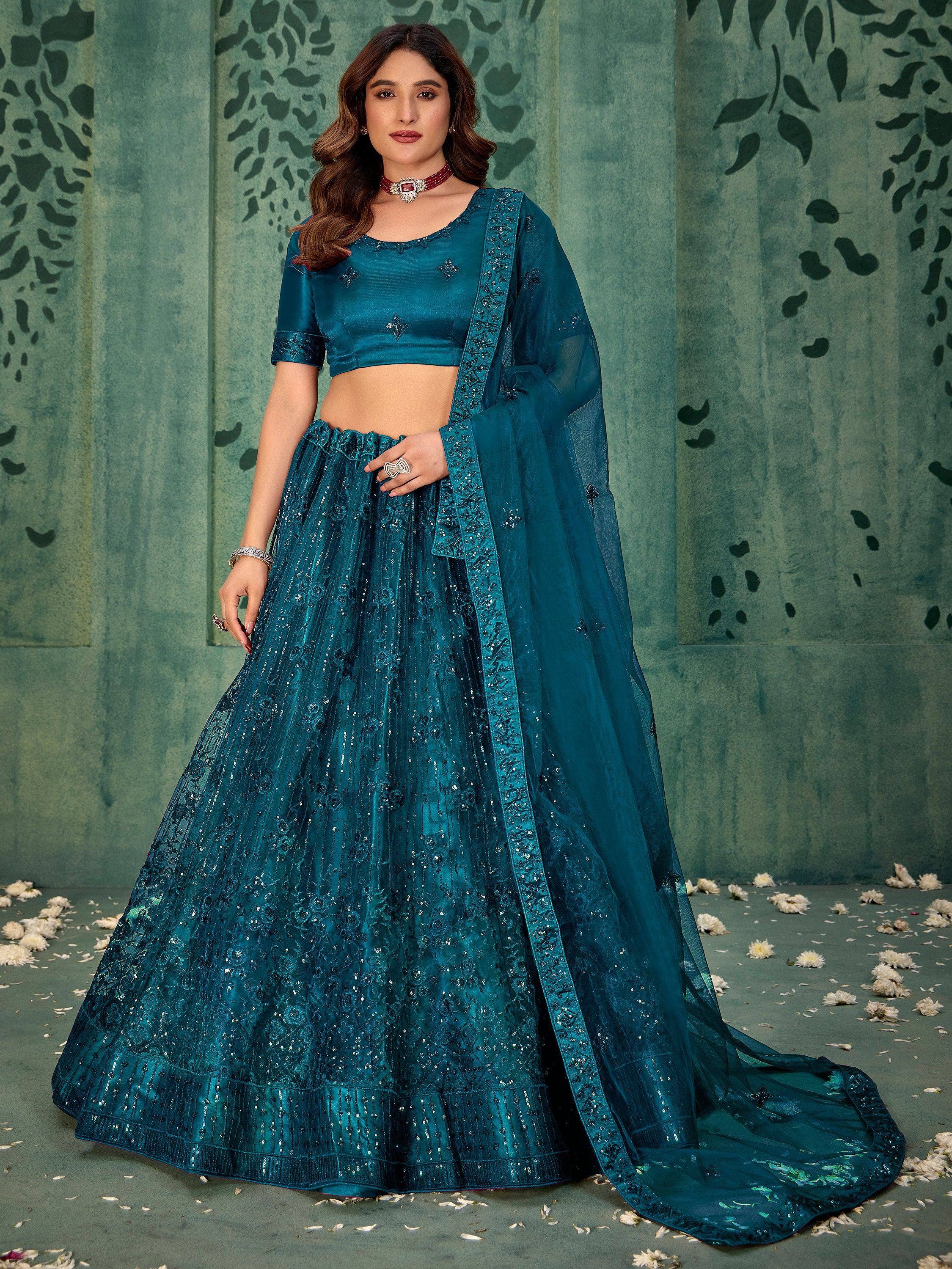 Teal blue embroidered lehenga choli with sequins, perfect for Indian ethnic wear and festive occasions.