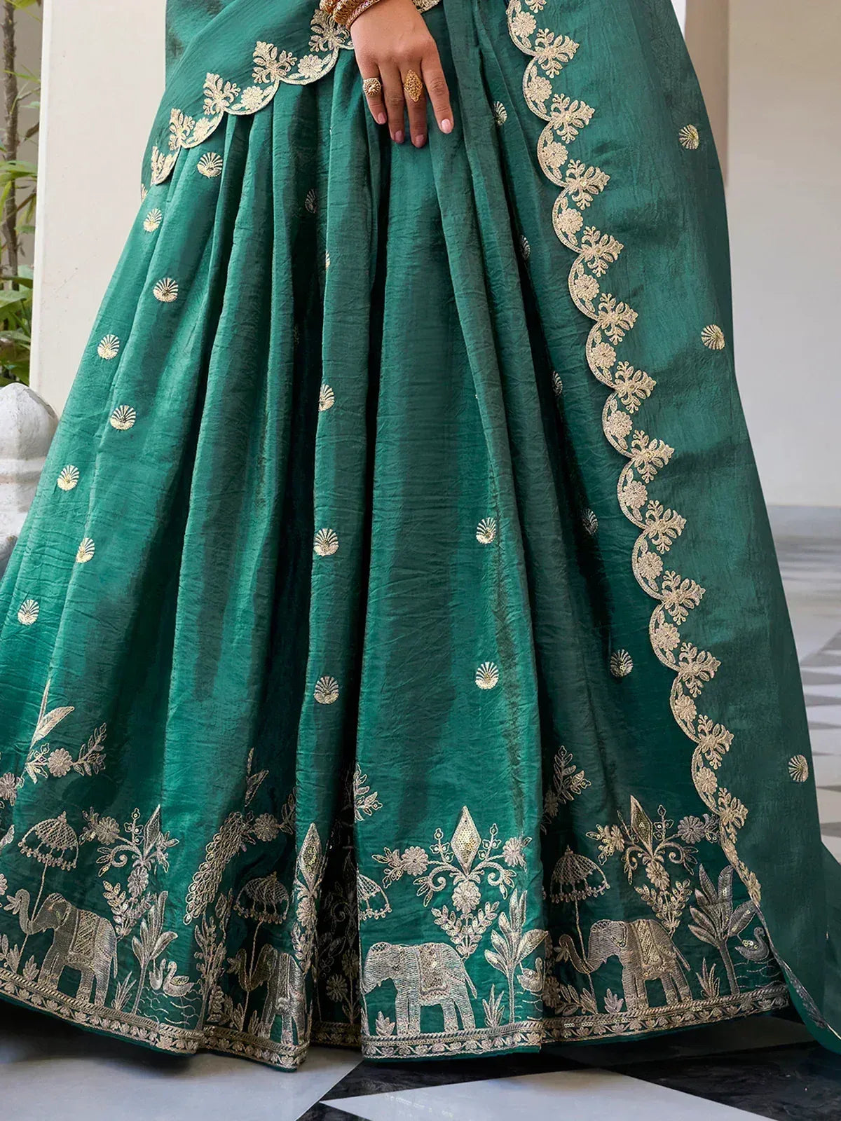 Emerald green lehenga with gold elephant and floral embroidery, Indian ethnic wear