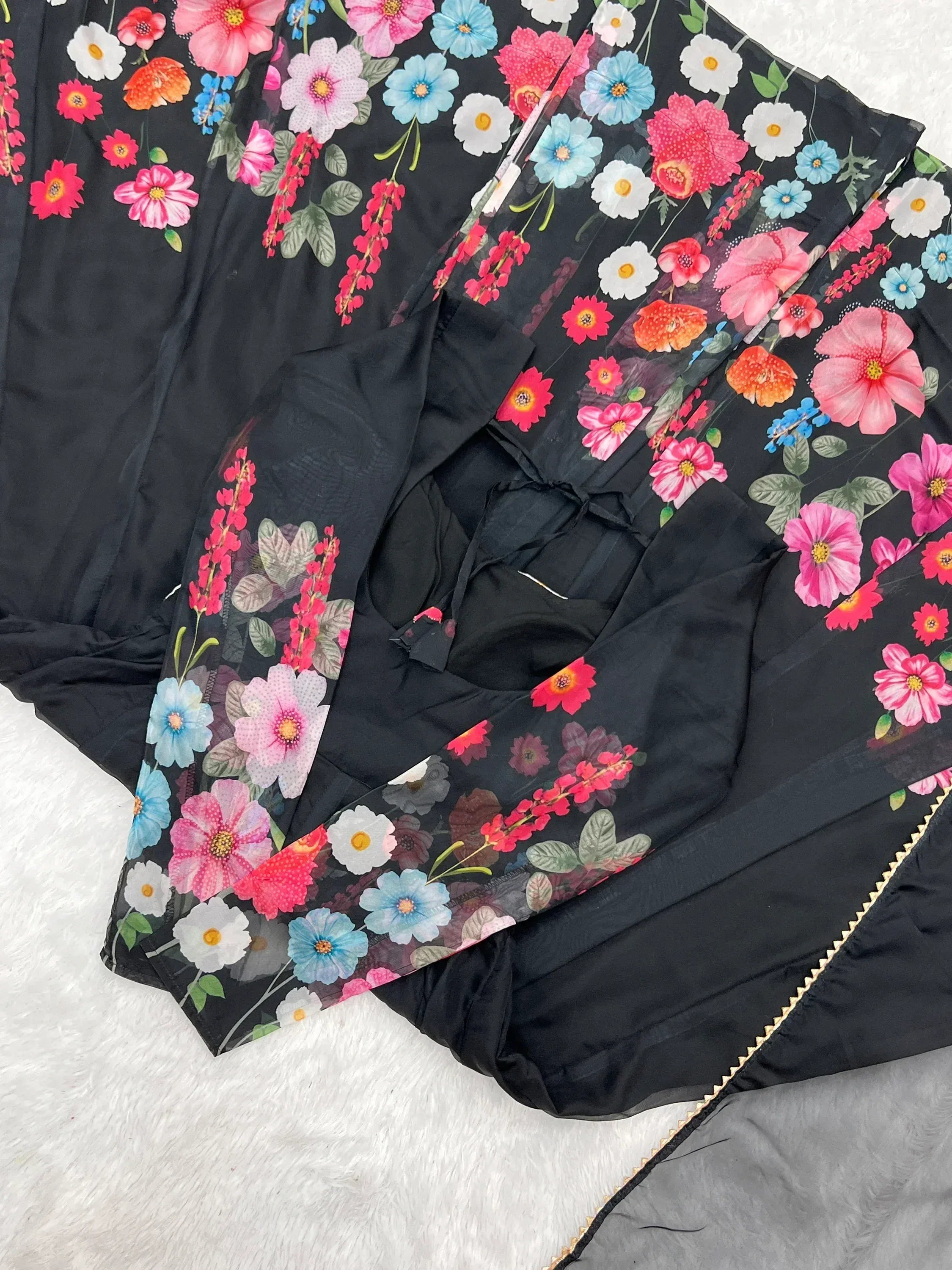 Black floral printed ethnic gown with vibrant pink, blue, and white flowers for women's wear