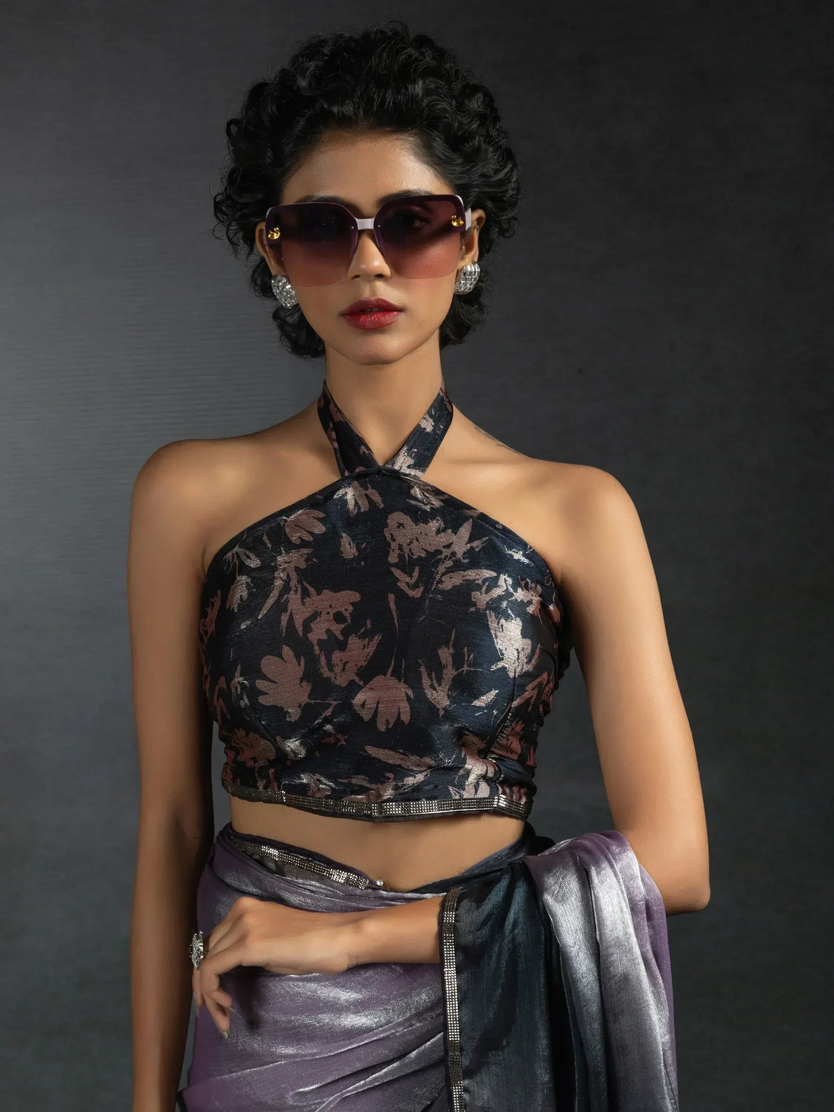 Stylish woman in floral halter neck top and metallic saree, modern Indian ethnic wear
