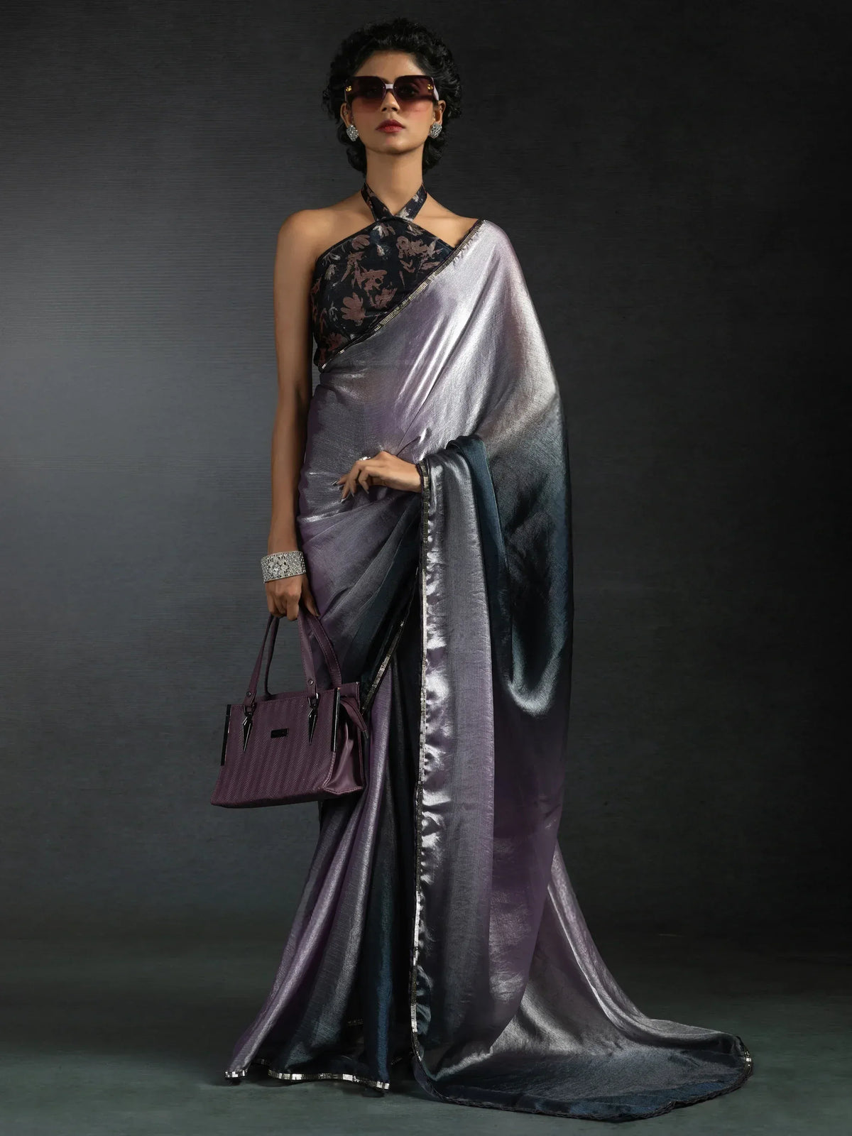Stylish purple metallic saree with floral blouse, perfect for Indian ethnic wear events