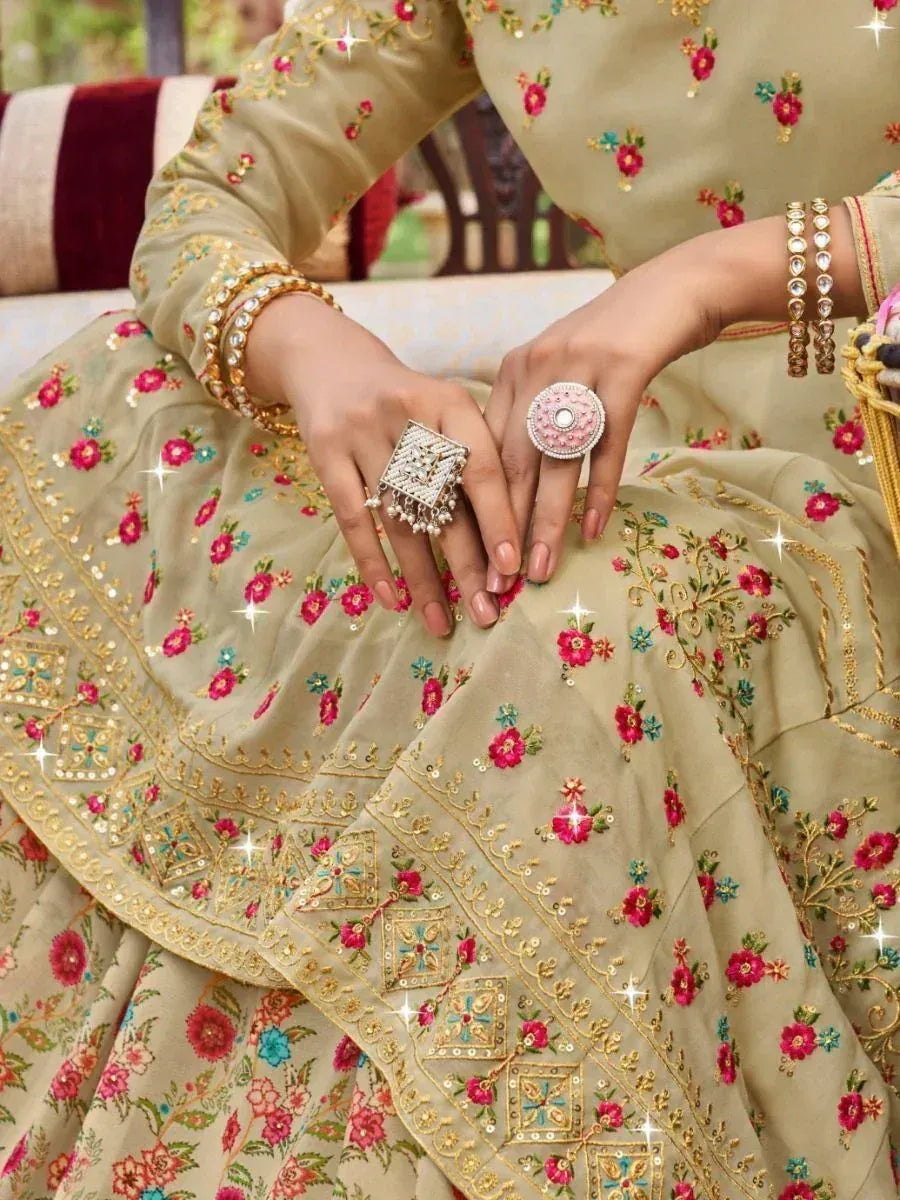 Floral embroidered lehenga choli with statement rings and bangles, perfect for Indian ethnic wear