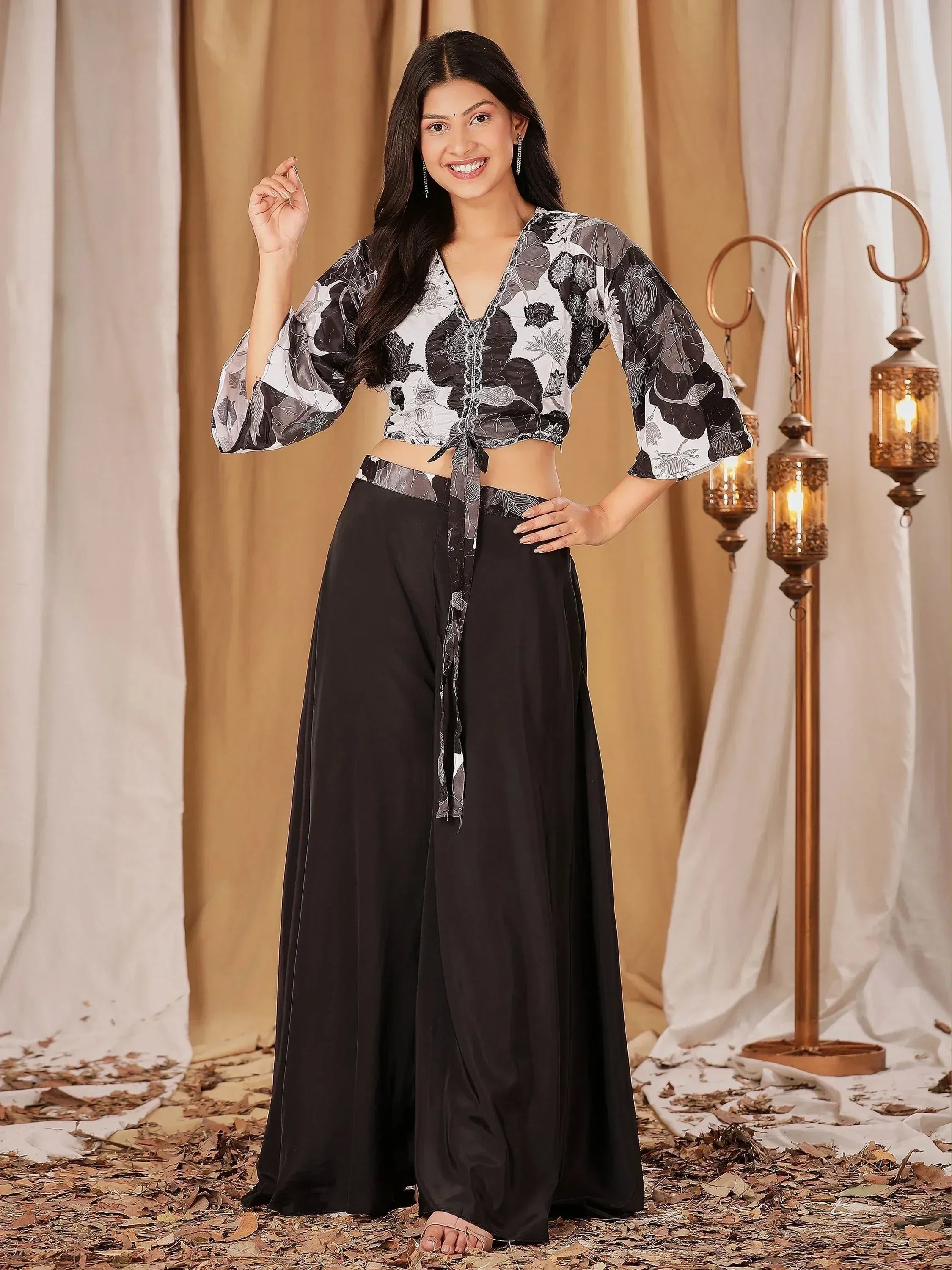 Stylish black and white floral crop top with wide-leg pants, perfect for ethnic wear