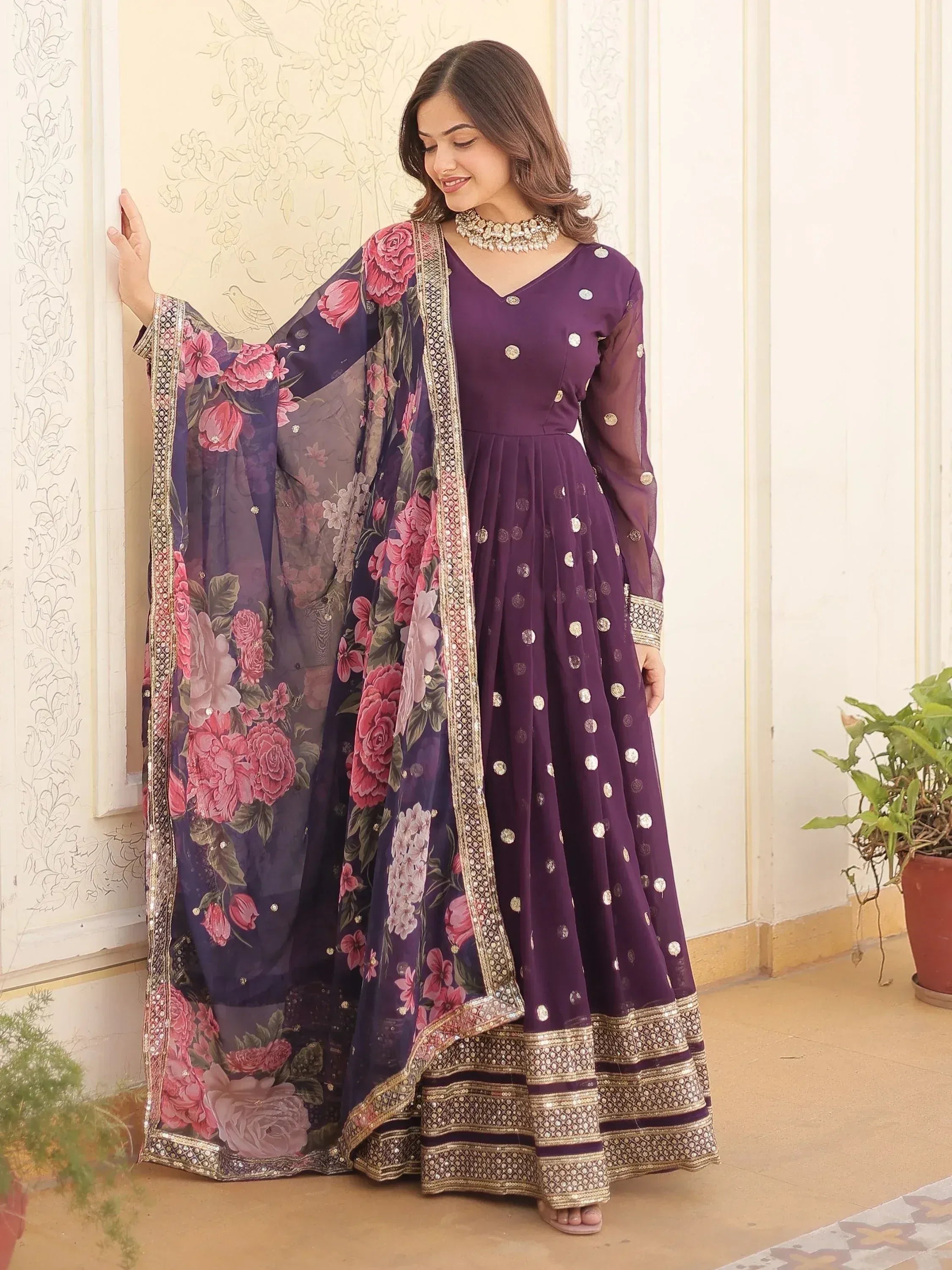 Purple anarkali with floral dupatta, gold embroidery, and sequin detailing for ethnic wear