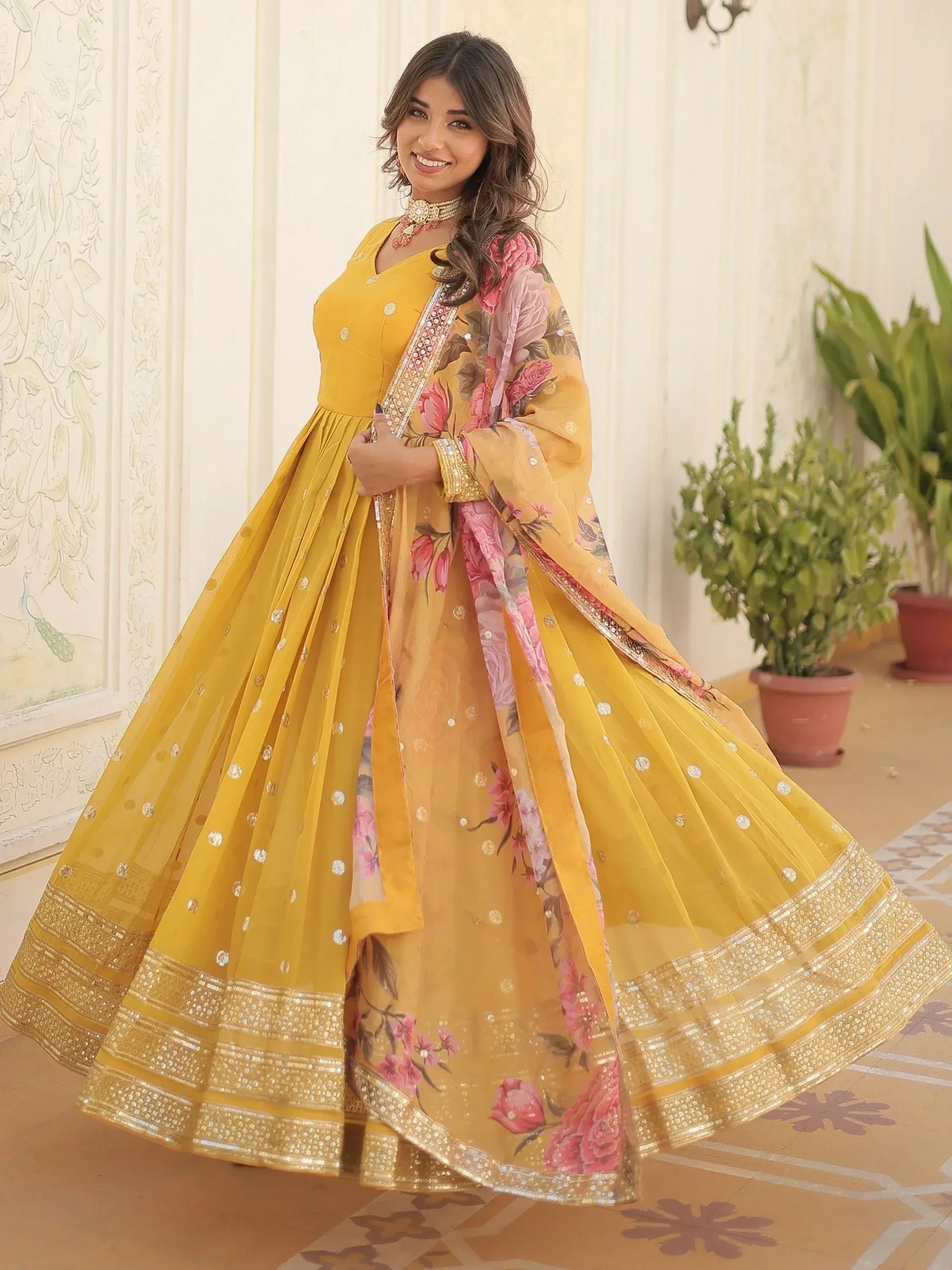 Yellow floral printed lehenga choli with gold embroidery, perfect for Indian ethnic wear occasions
