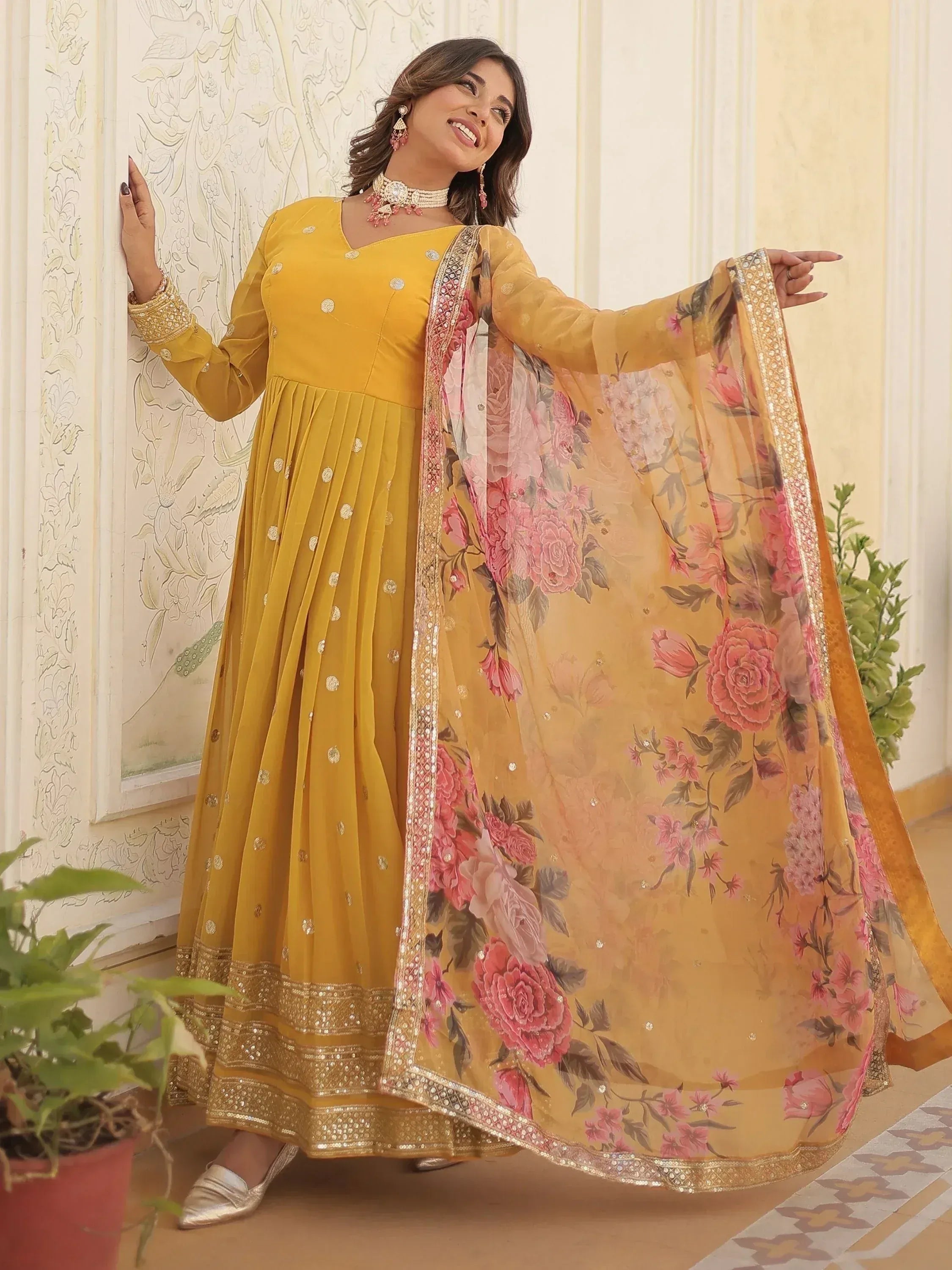 Yellow ethnic anarkali with floral dupatta, perfect for Indian occasions and festive wear.