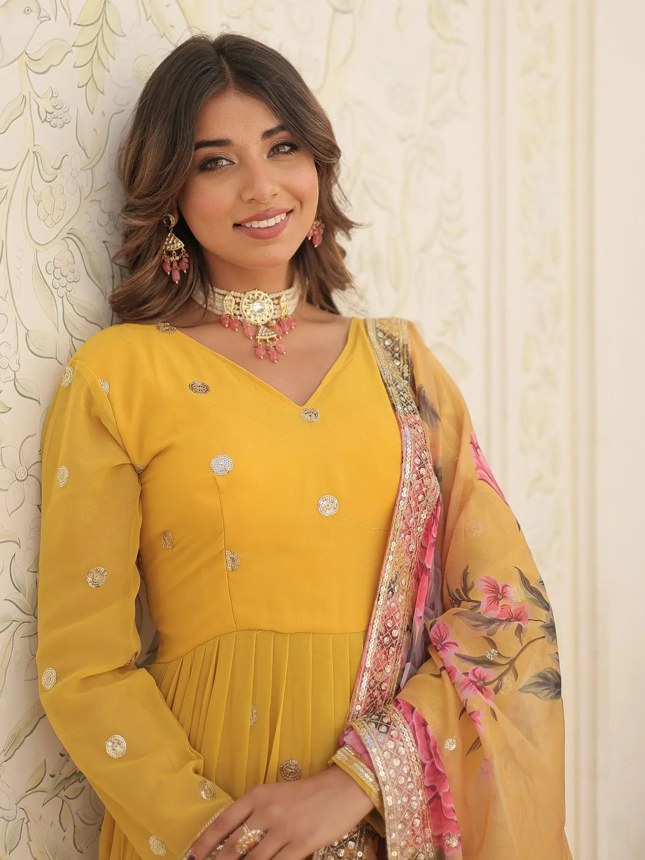 Yellow ethnic gown with floral dupatta, perfect for Indian occasions and festive wear
