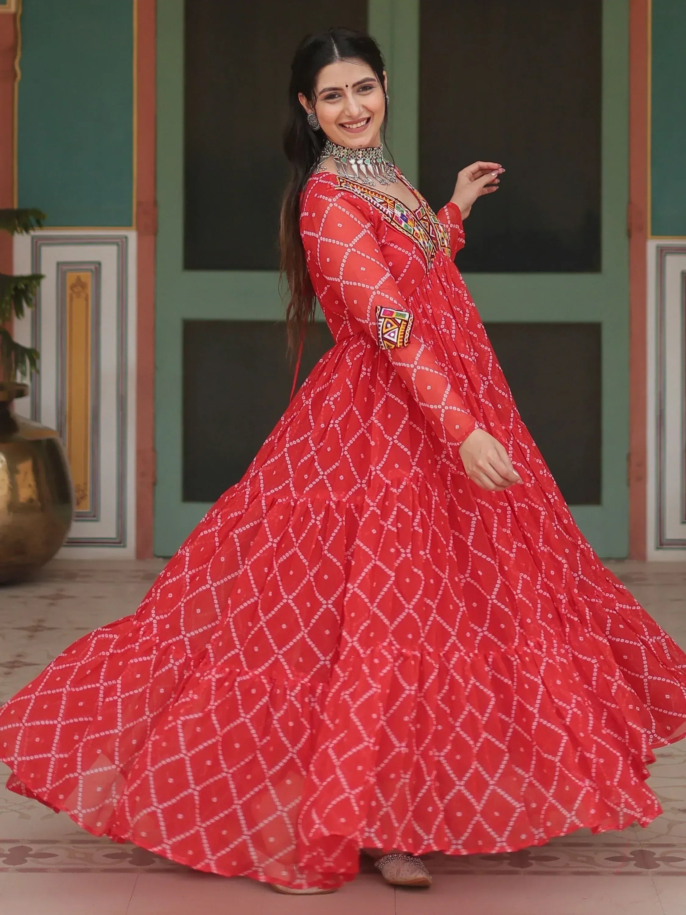 Red ethnic gown with white geometric print, perfect for Indian festivals and weddings