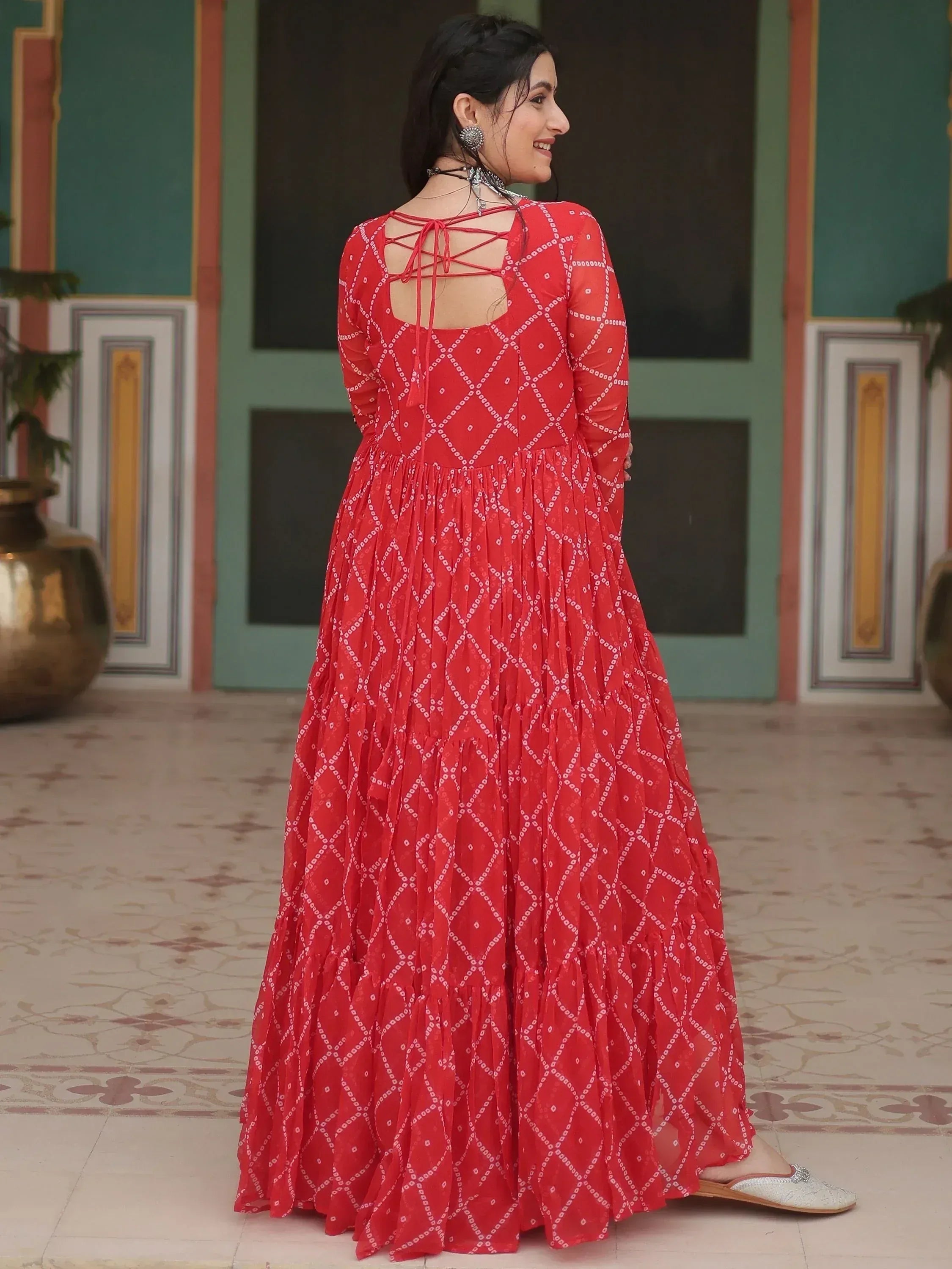 Red ethnic gown with white geometric print, back tie-up design, perfect for Indian occasions