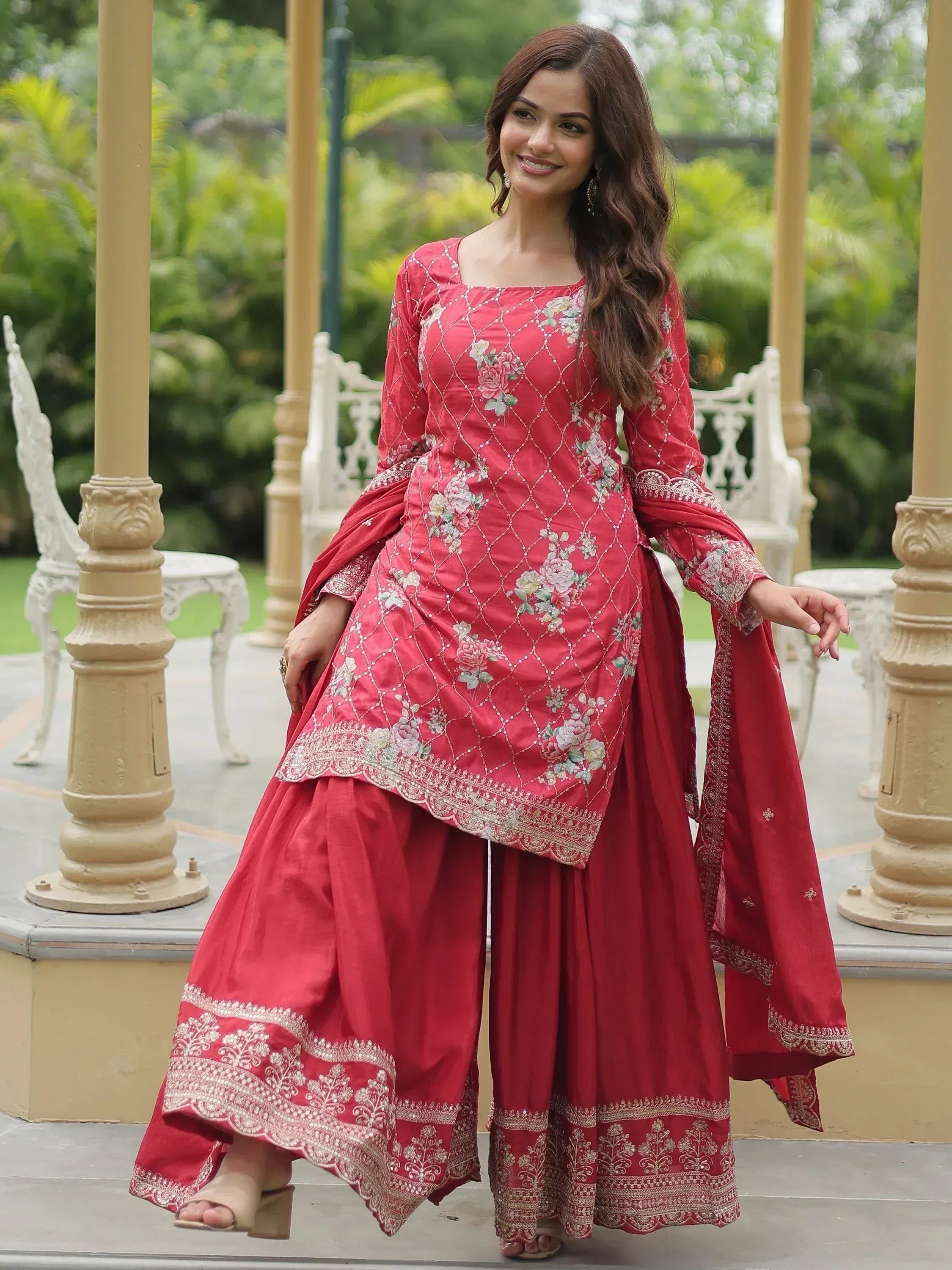 Red floral embroidered salwar kameez with palazzo pants and dupatta, perfect for ethnic occasions.