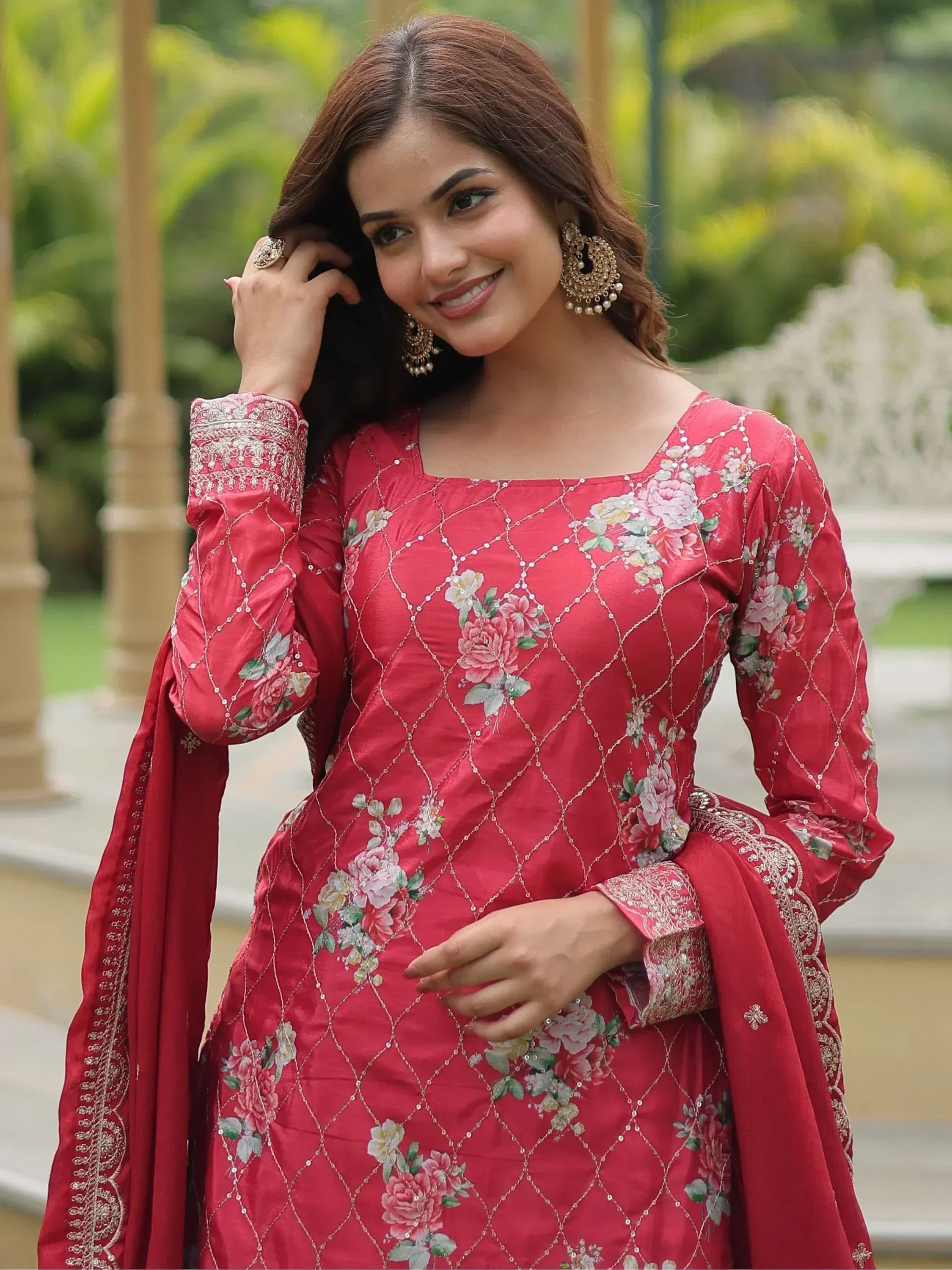 Red floral embroidered ethnic gown with diamond patterns and matching dupatta