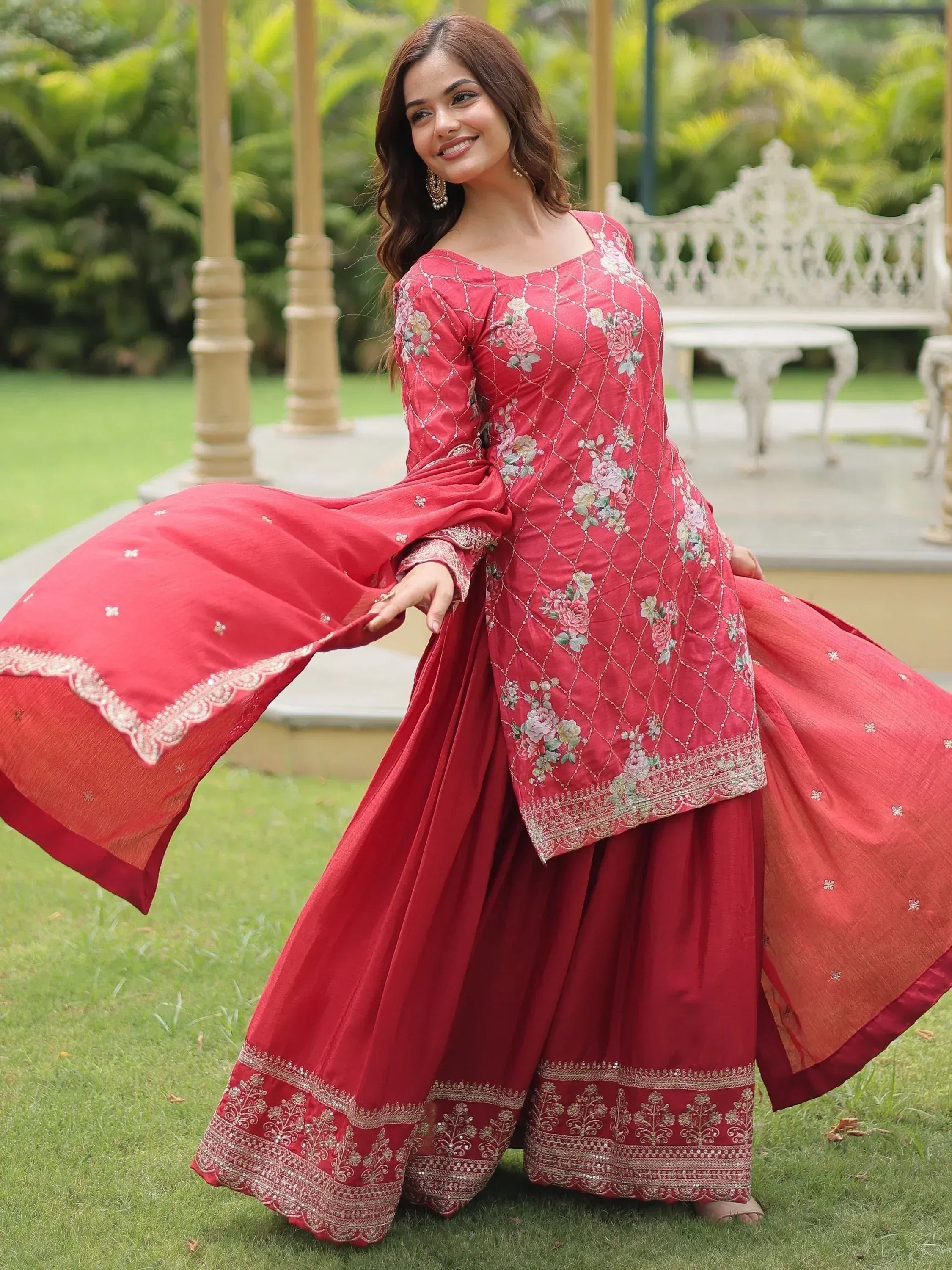 Red floral embroidered salwar kameez with wide sleeves, perfect for Indian ethnic wear occasions