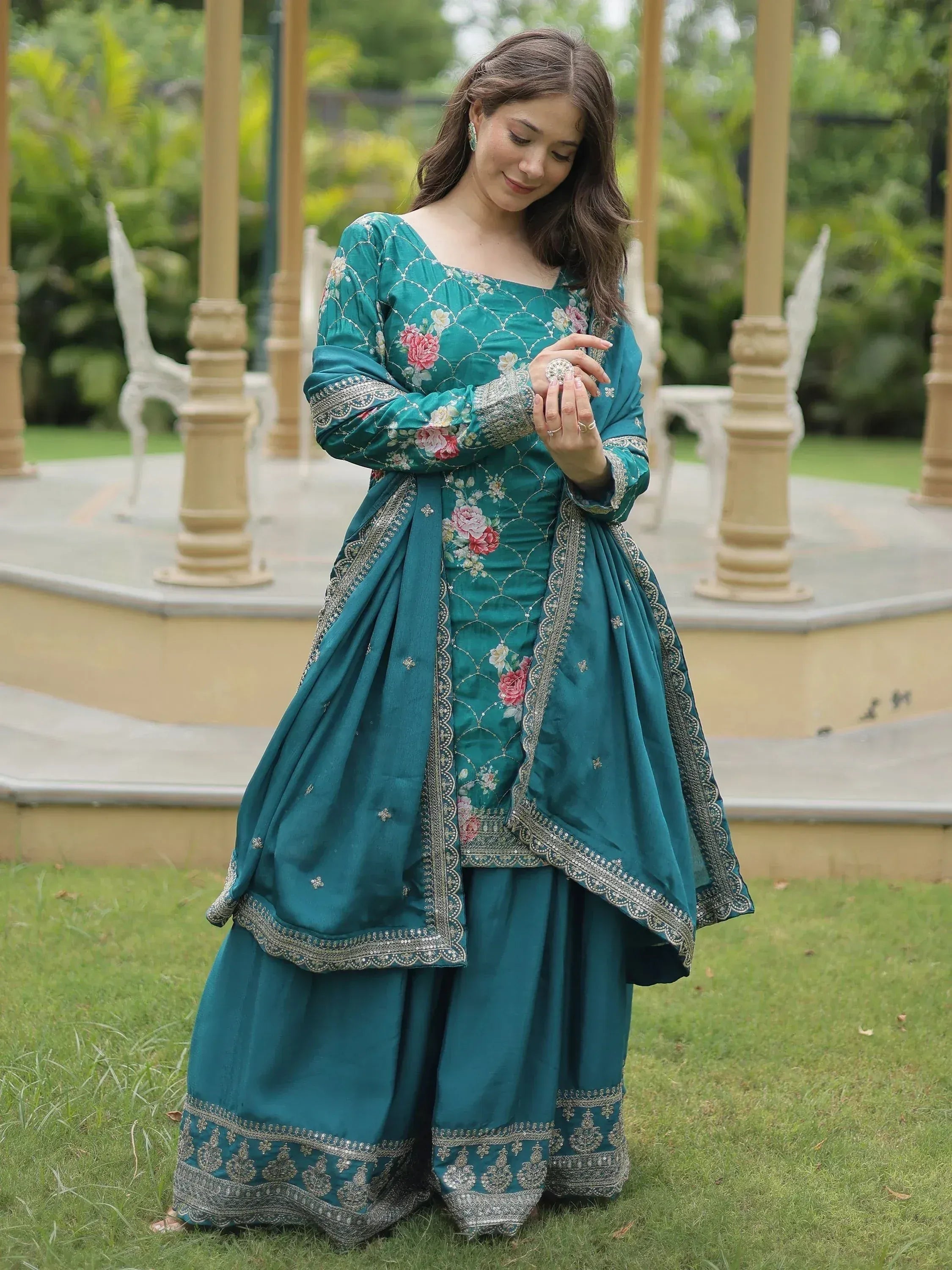 Teal floral embroidered Indian ethnic wear with silver detailing, perfect for festive occasions