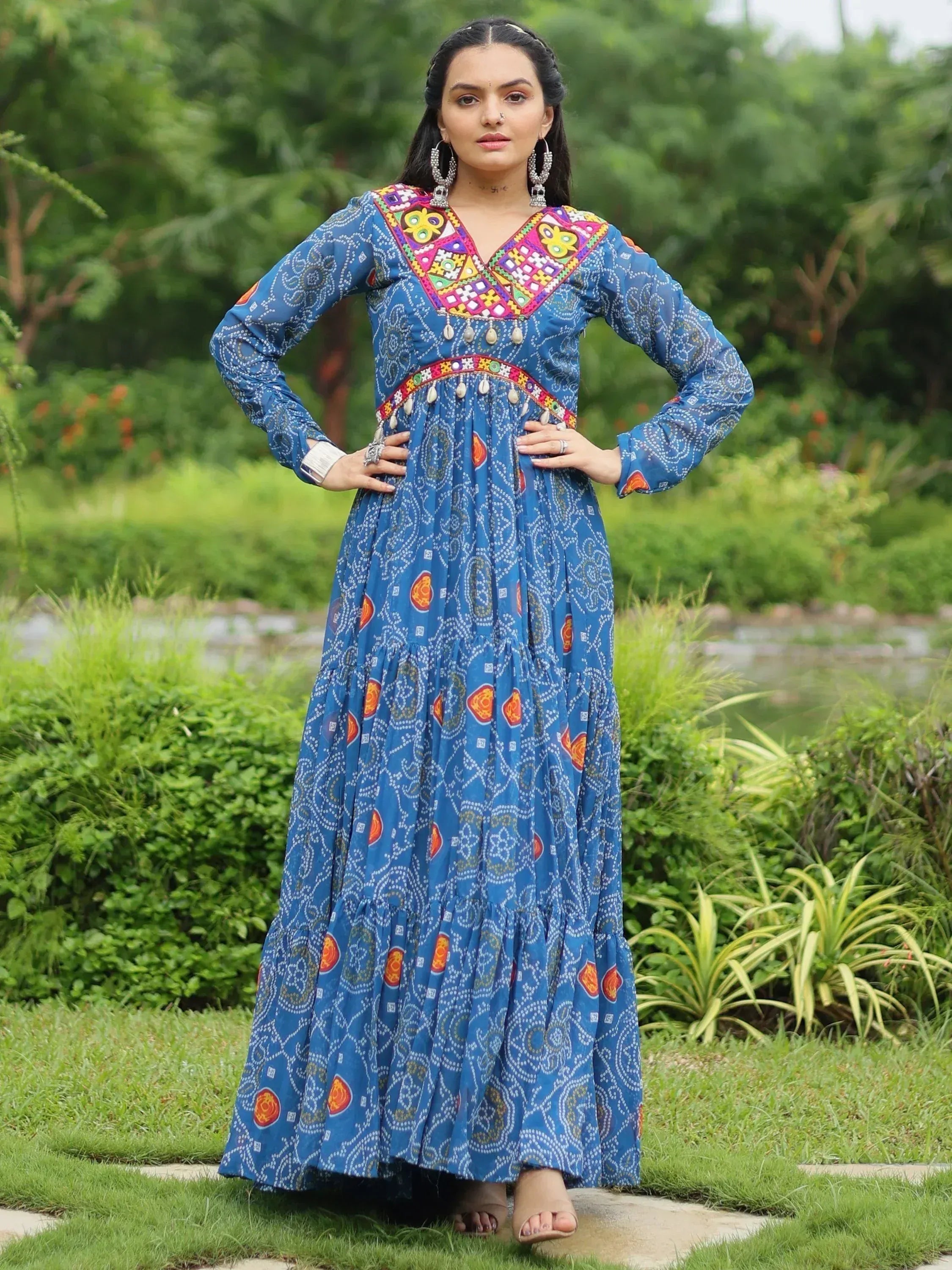 Blue ethnic gown with colorful embroidery and mirror work, perfect for Indian festive occasions