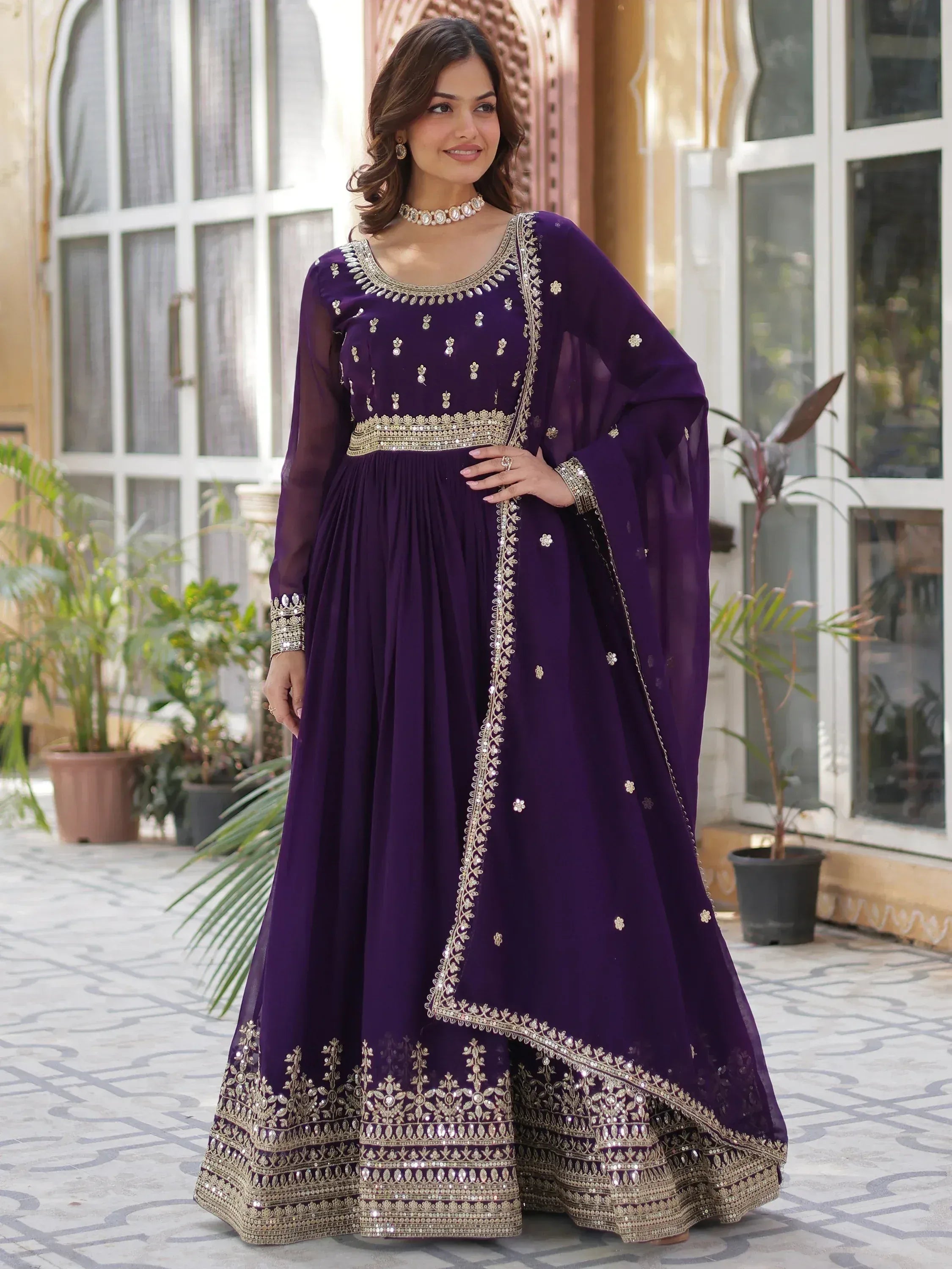 Elegant purple anarkali with gold embroidery, perfect for Indian ethnic wear and festive occasions.