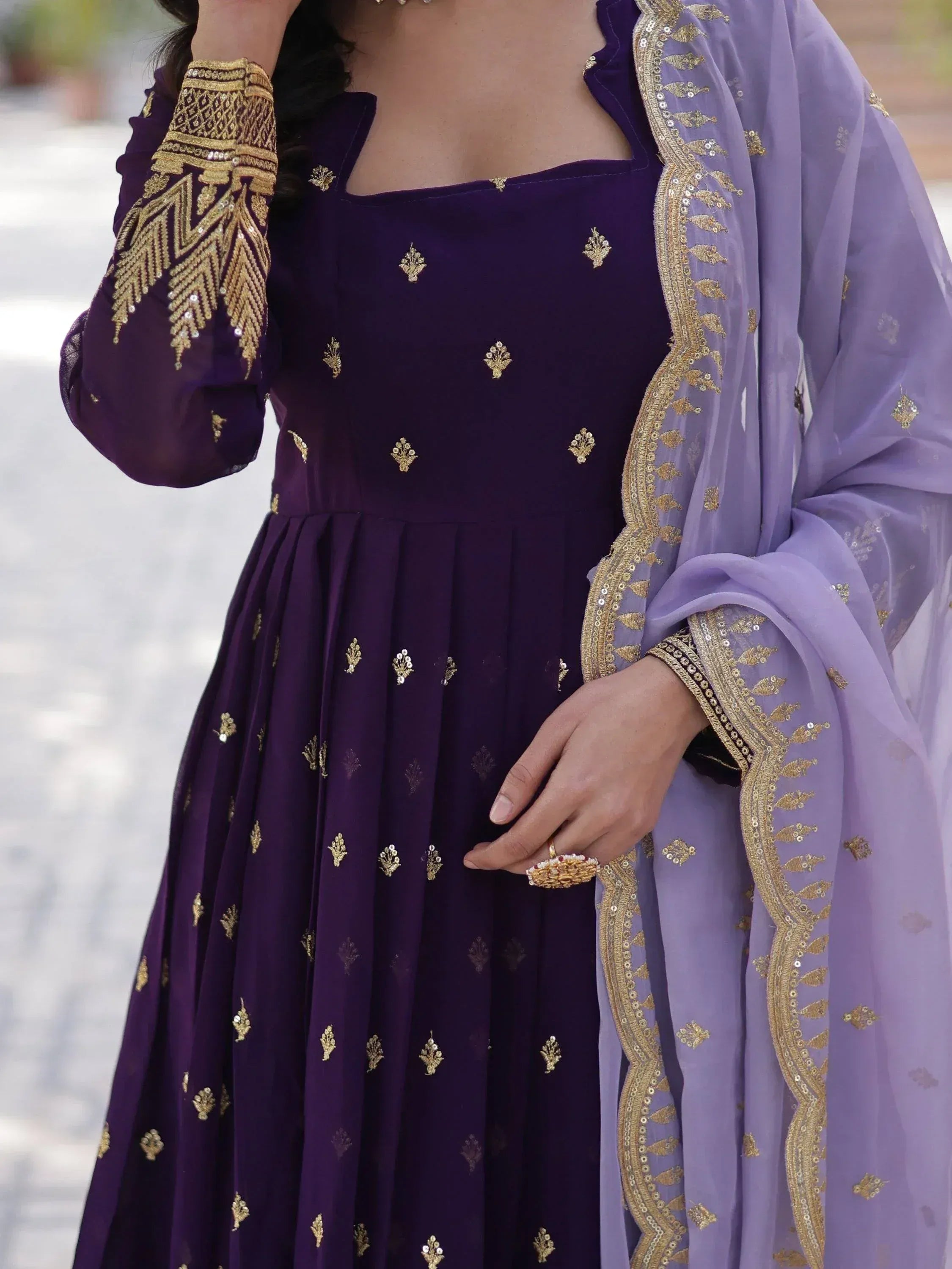 Purple ethnic gown with gold embroidery and matching dupatta for Indian wear