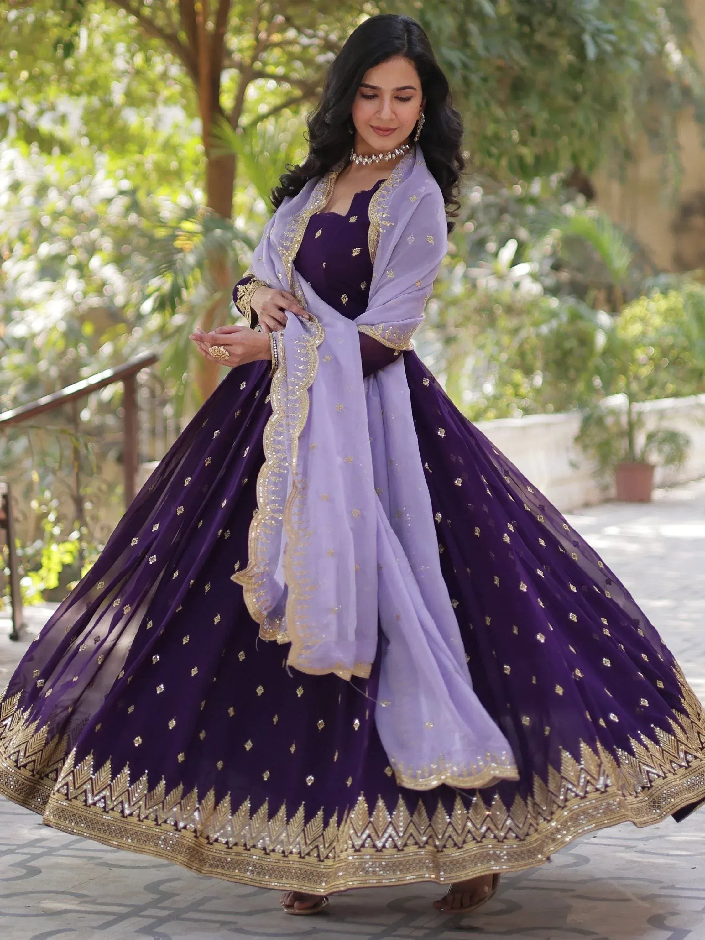 Elegant purple lehenga choli with gold embroidery and lavender dupatta for Indian ethnic wear