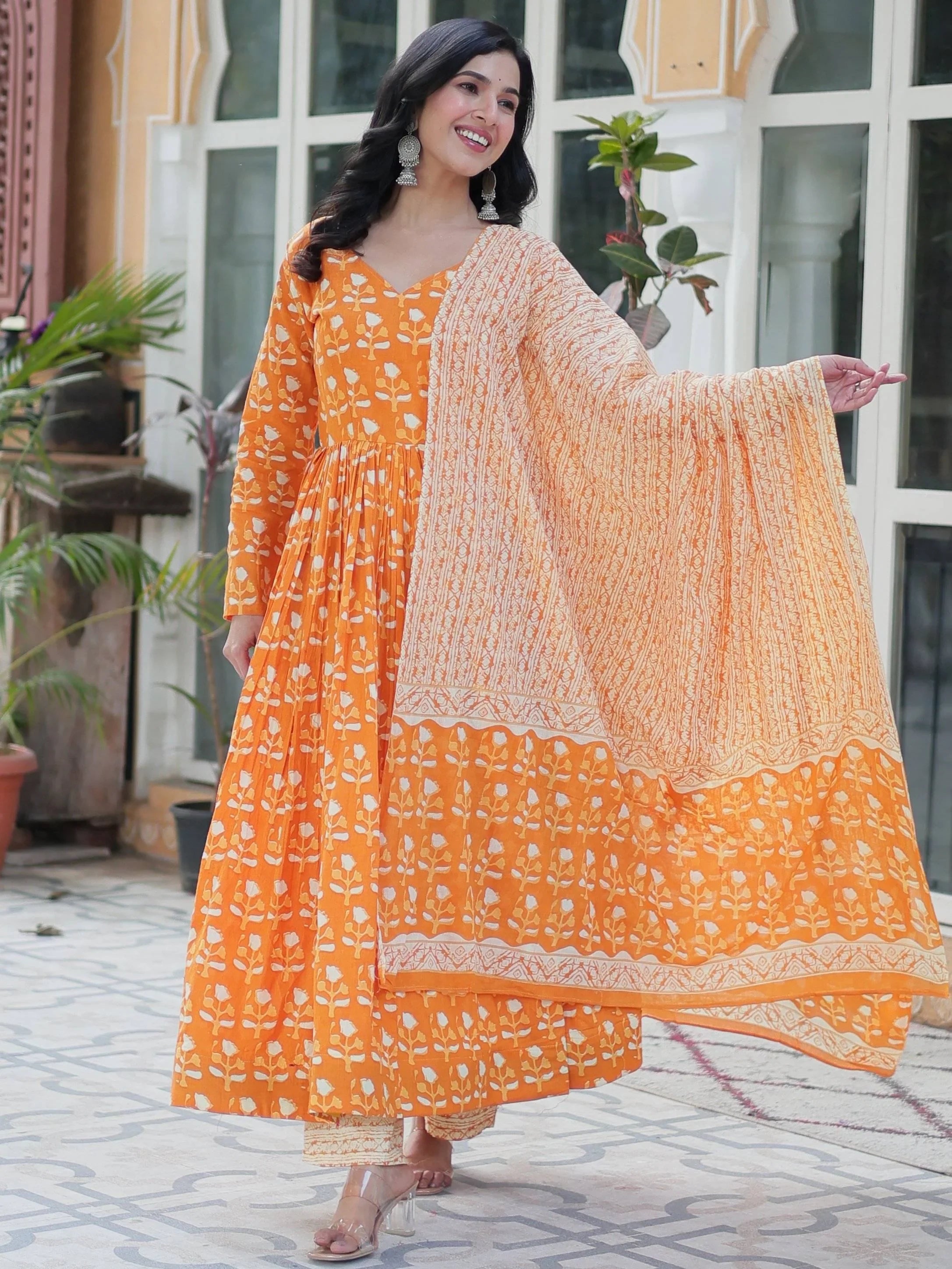 Alluring Orange Floral Printed Cotton Anarkali Suit With Dupatta