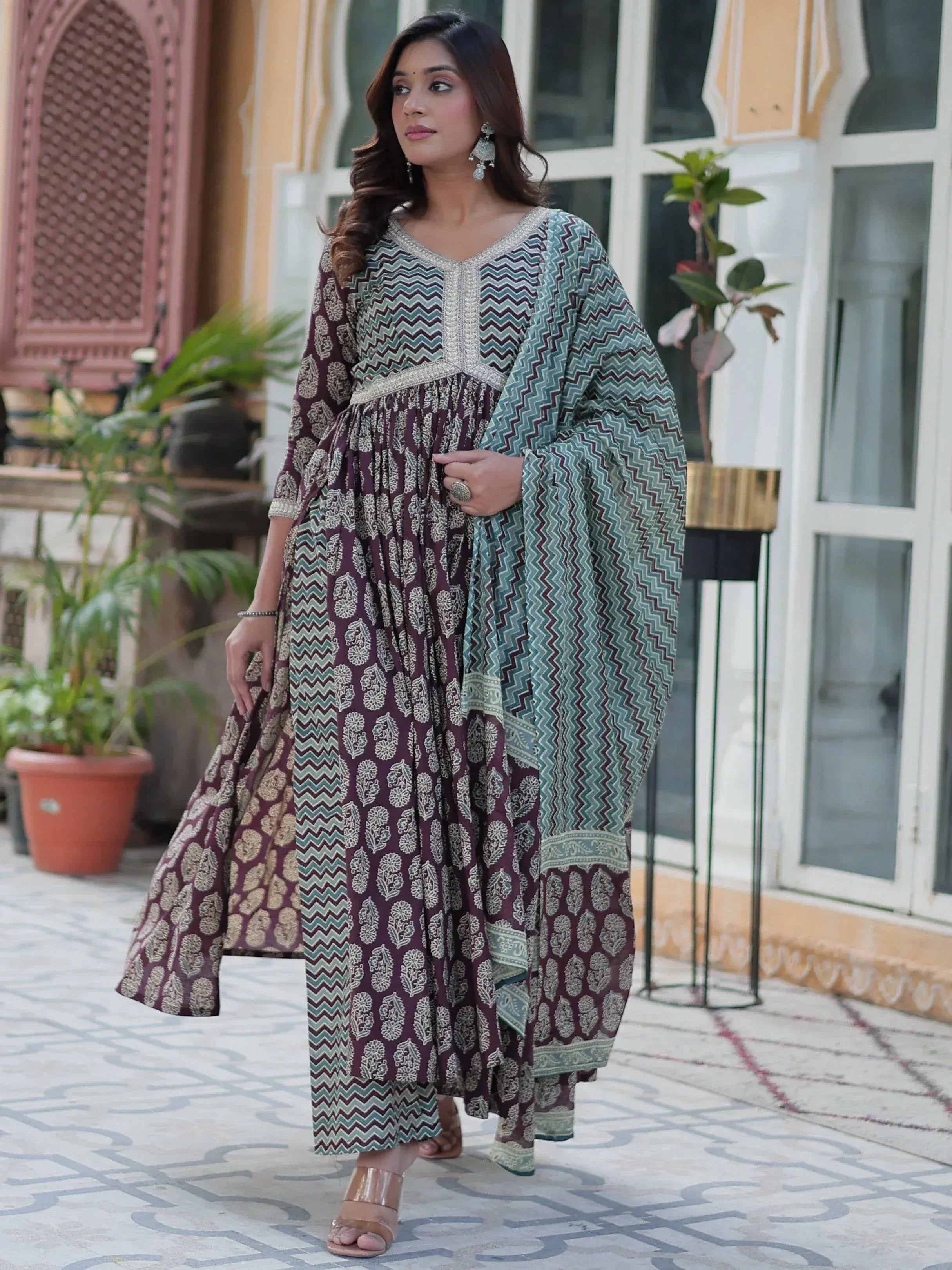 Woman in ethnic printed kurta with palazzo pants, perfect for Indian festive occasions