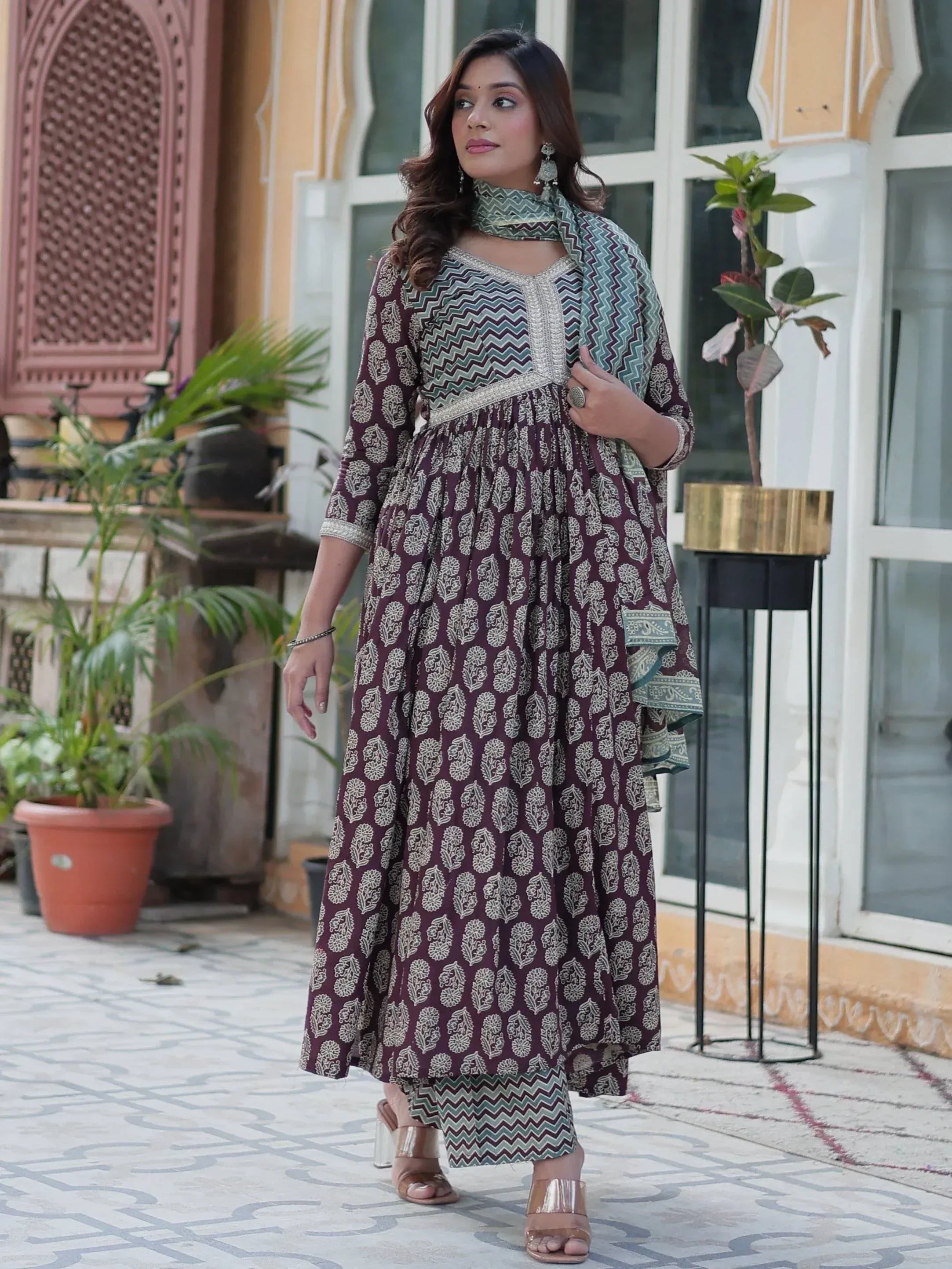 Elegant maroon printed ethnic gown with matching dupatta, perfect for Indian occasions