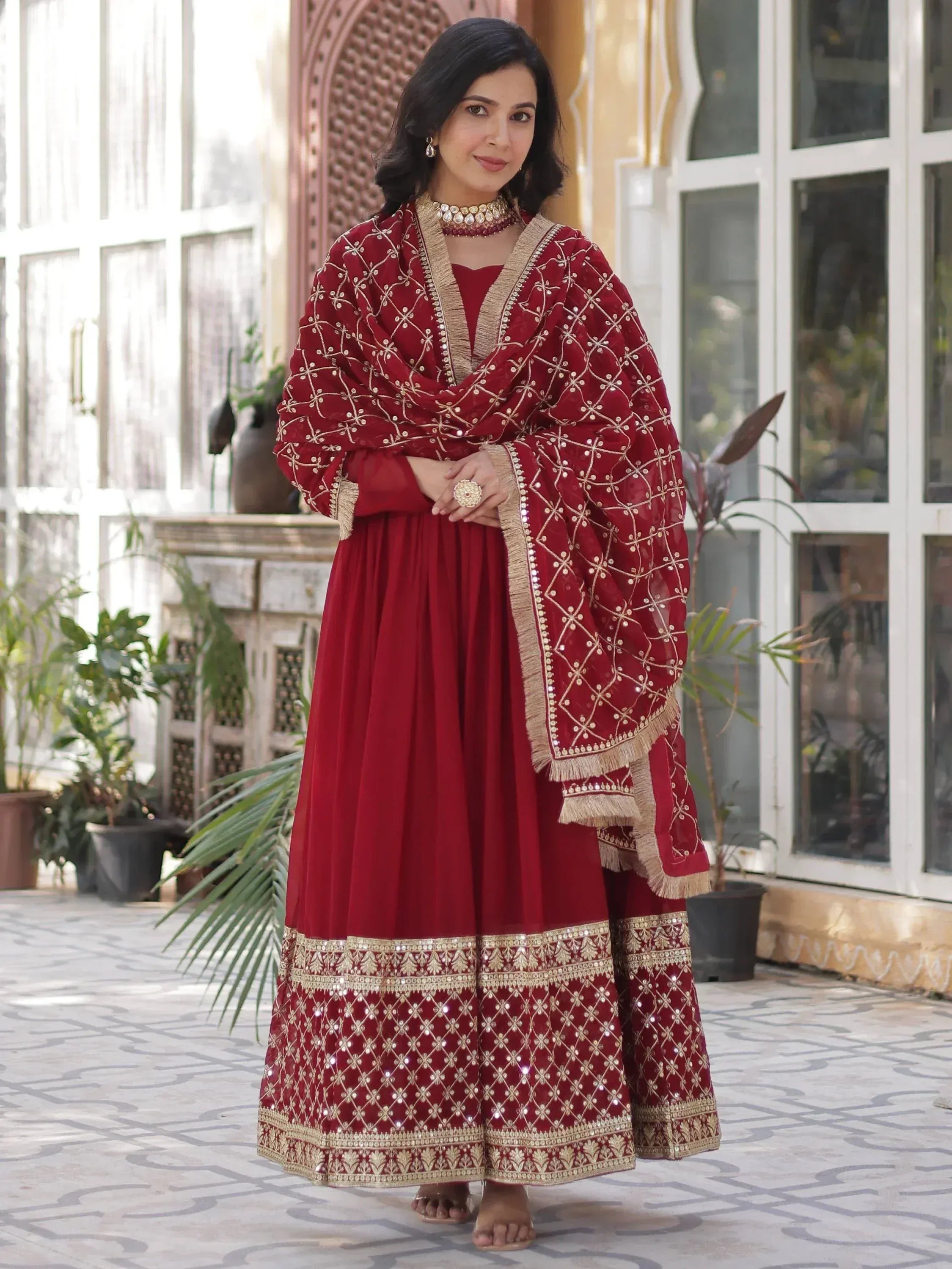 Maroon embroidered anarkali suit with gold detailing, perfect for Indian ethnic wear occasions