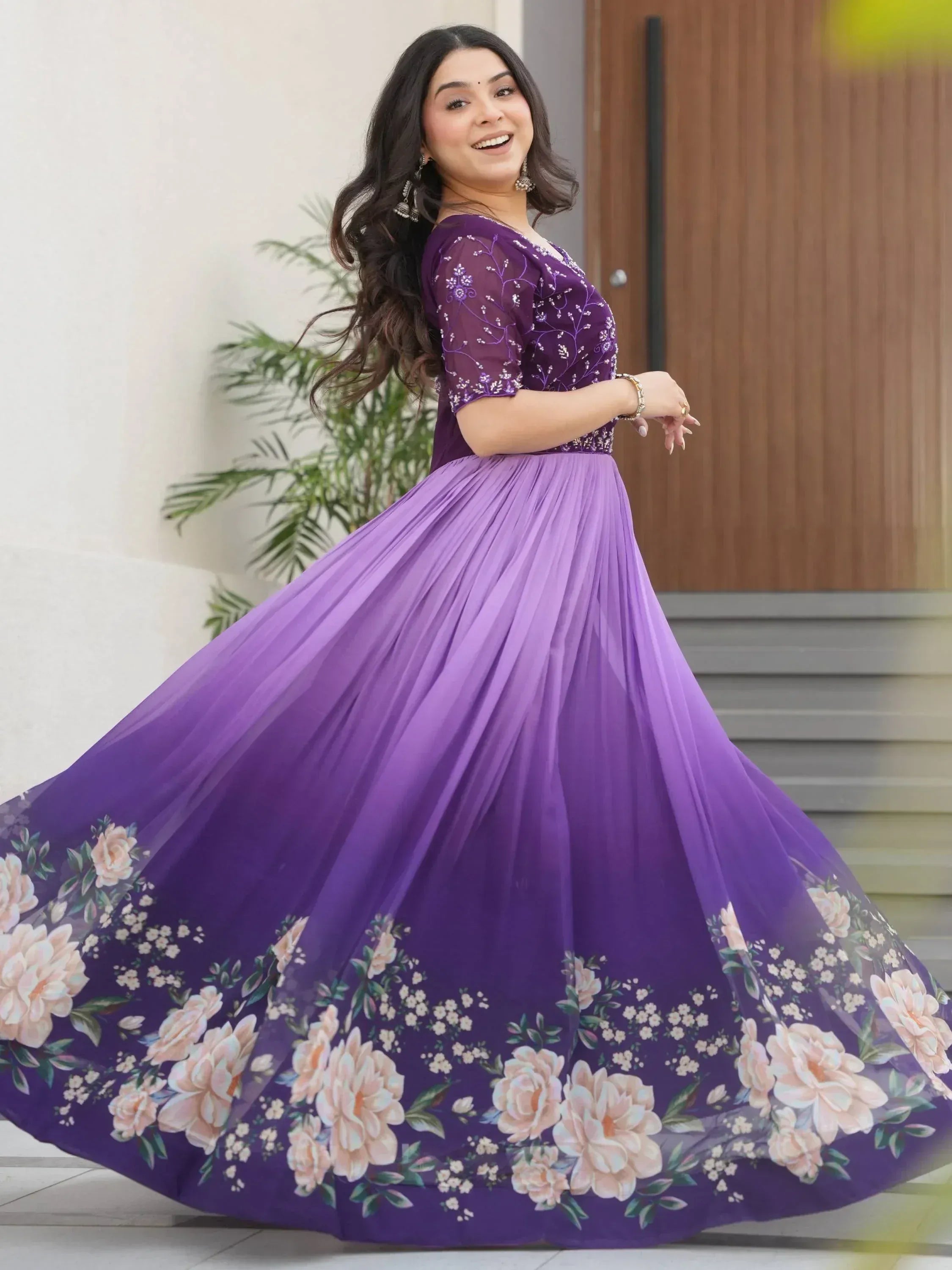 Purple floral ethnic gown with embroidered bodice, perfect for Indian occasions and festive wear.