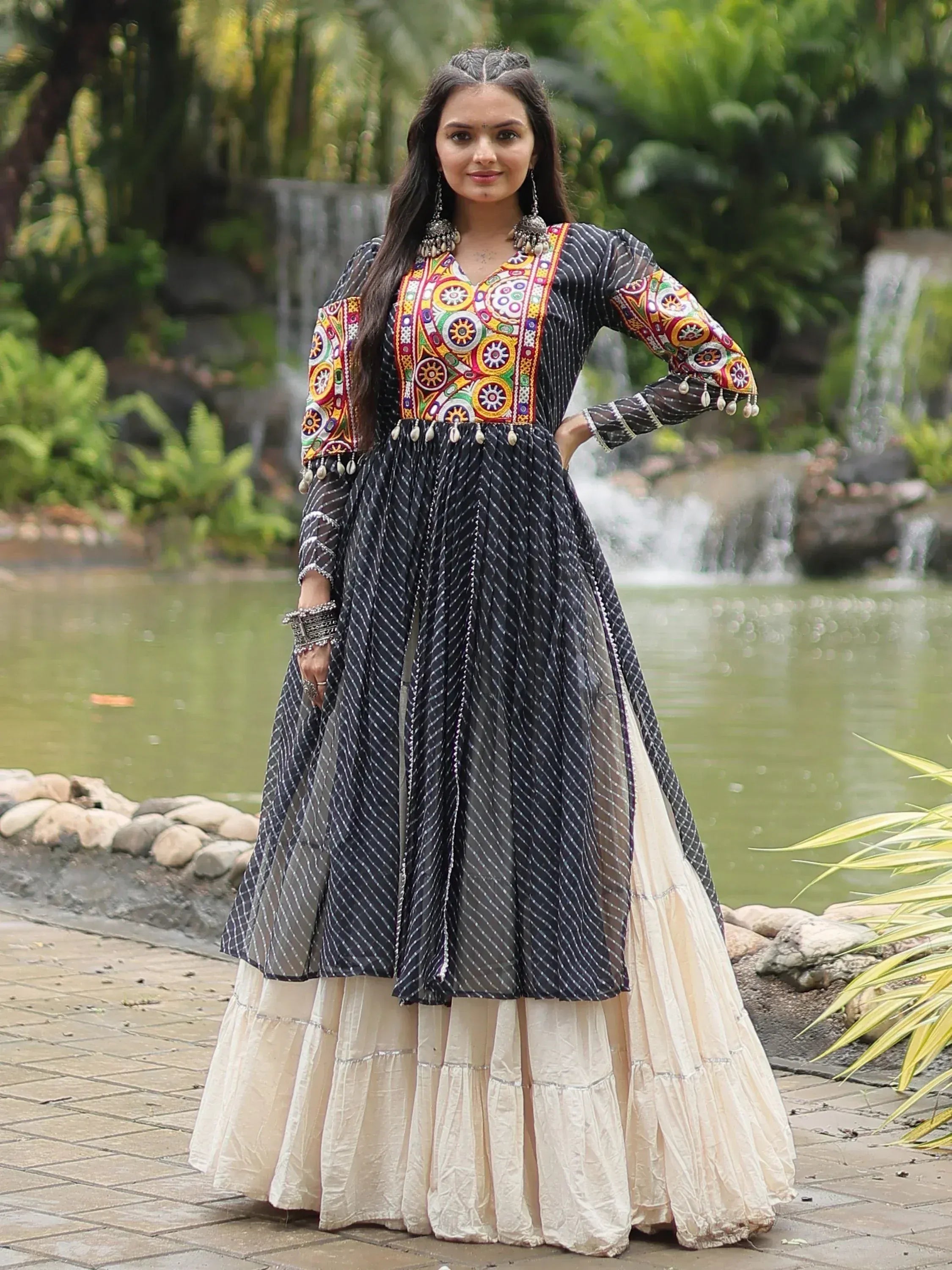 Black and cream ethnic gown with colorful embroidery, perfect for Indian festive wear