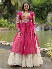 Woman in pink embroidered ethnic gown with silver jewelry near lake, Ethnic Plus fashion