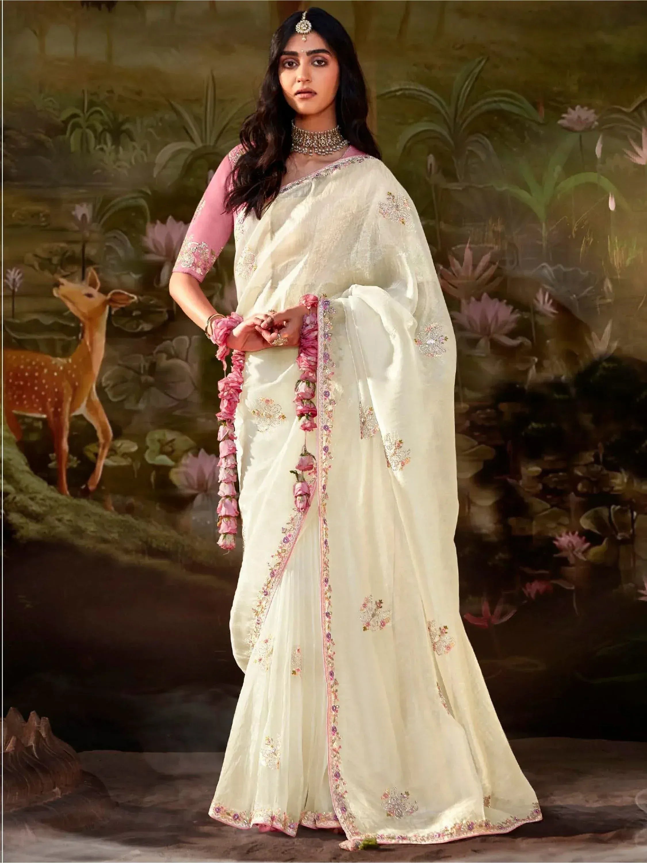 Elegant ivory saree with pink floral embroidery and blouse, perfect for Indian ethnic occasions.