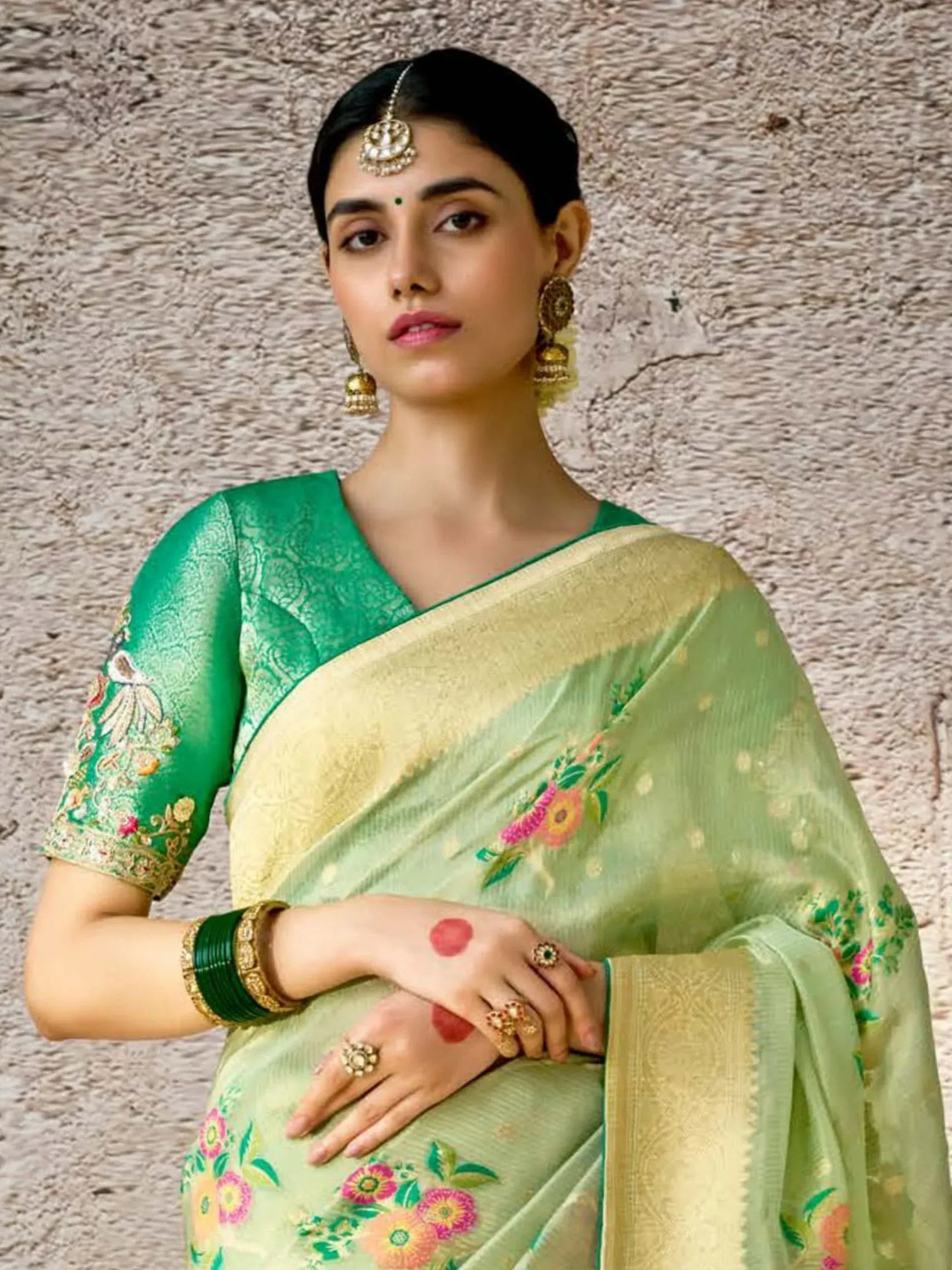 Green floral embroidered saree with golden border, traditional Indian ethnic wear for women