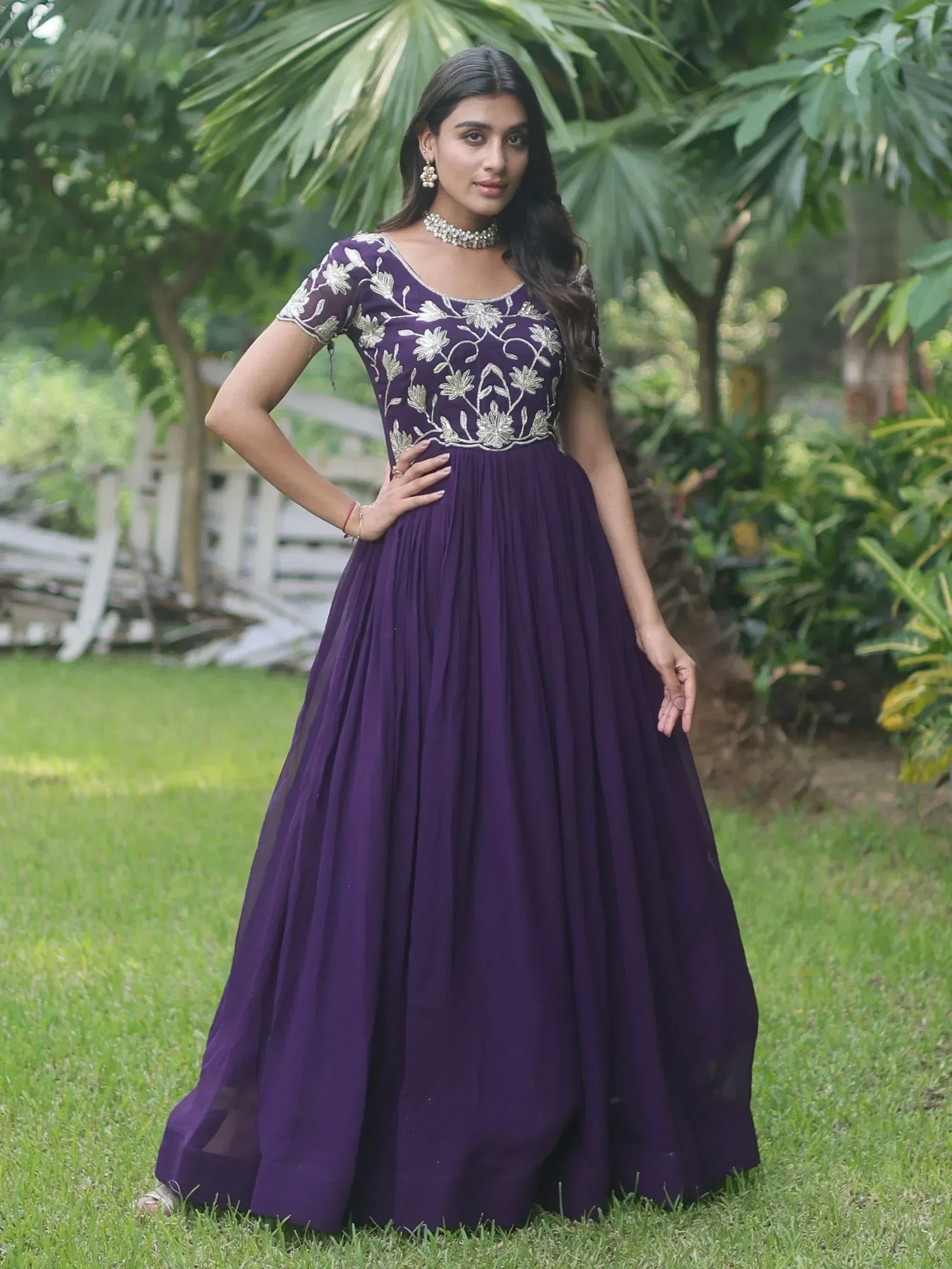 Purple ethnic gown with silver floral embroidery, perfect for Indian occasions and festive events.