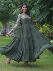 Marvelous Olive Green Sequins Georgette Mehendi Wear Gown