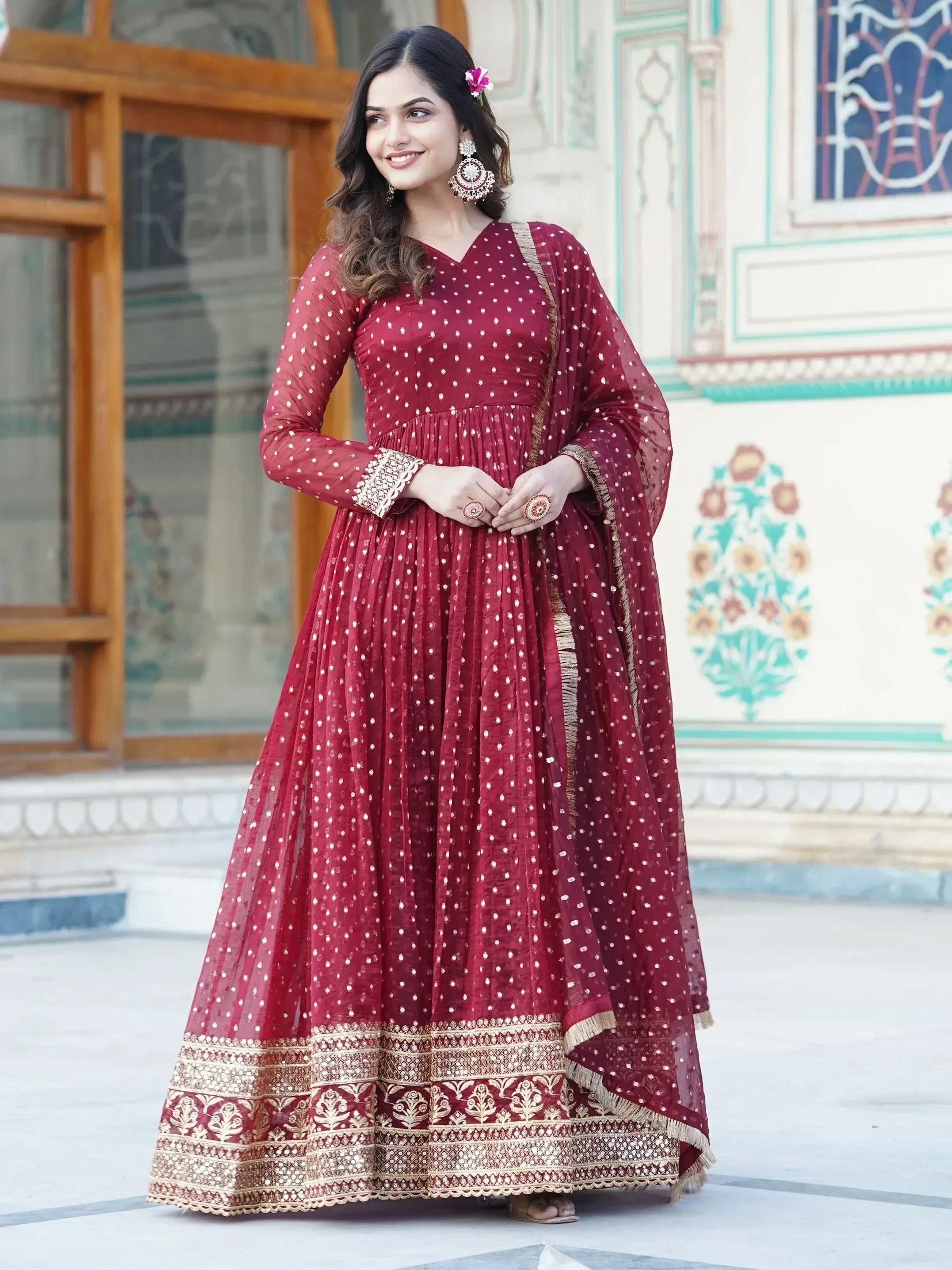 Maroon ethnic anarkali gown with gold embroidery and polka dots, perfect for Indian weddings and festivals