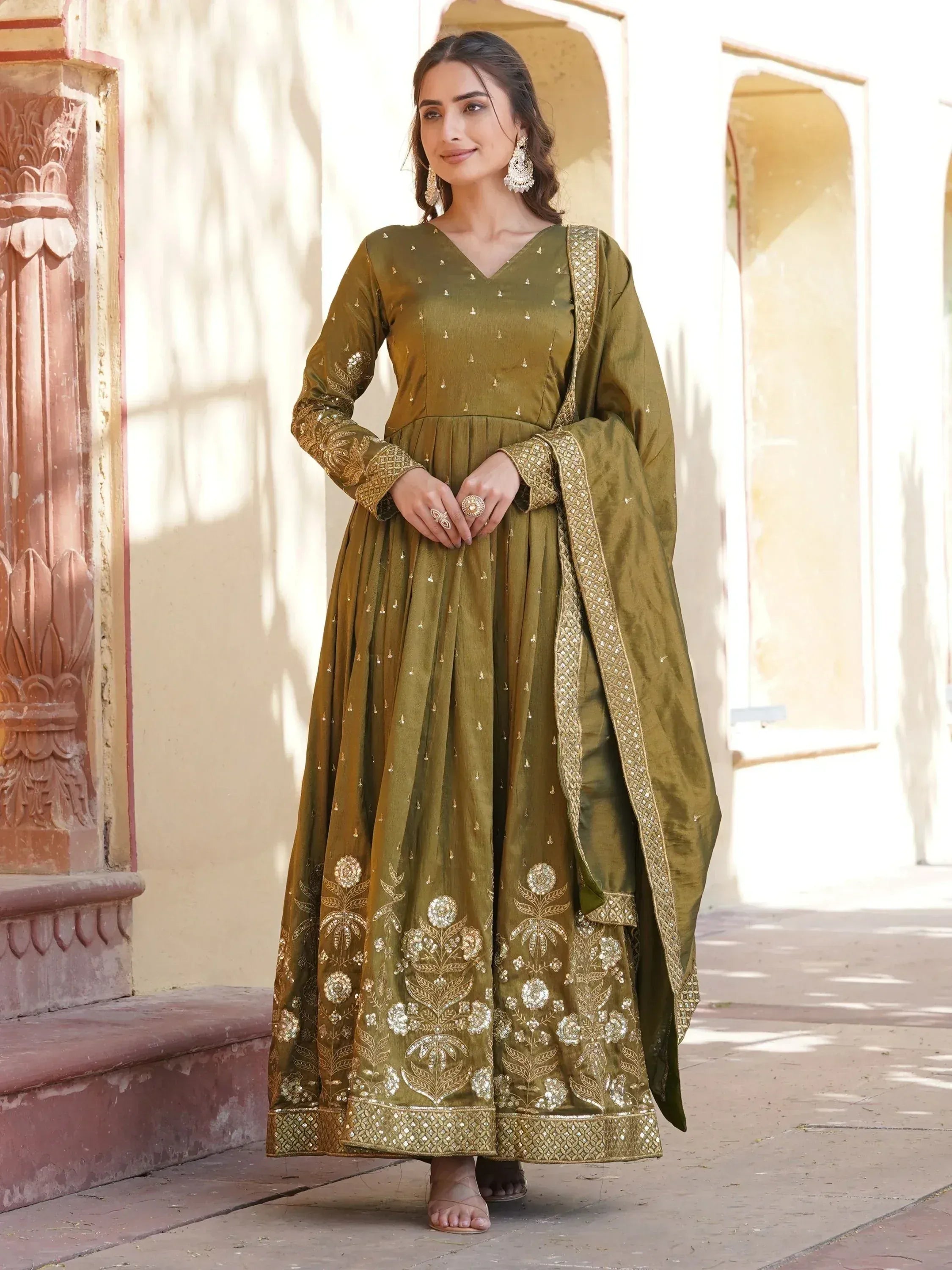Olive green embroidered anarkali suit with gold detailing, perfect for Indian ethnic wear occasions.