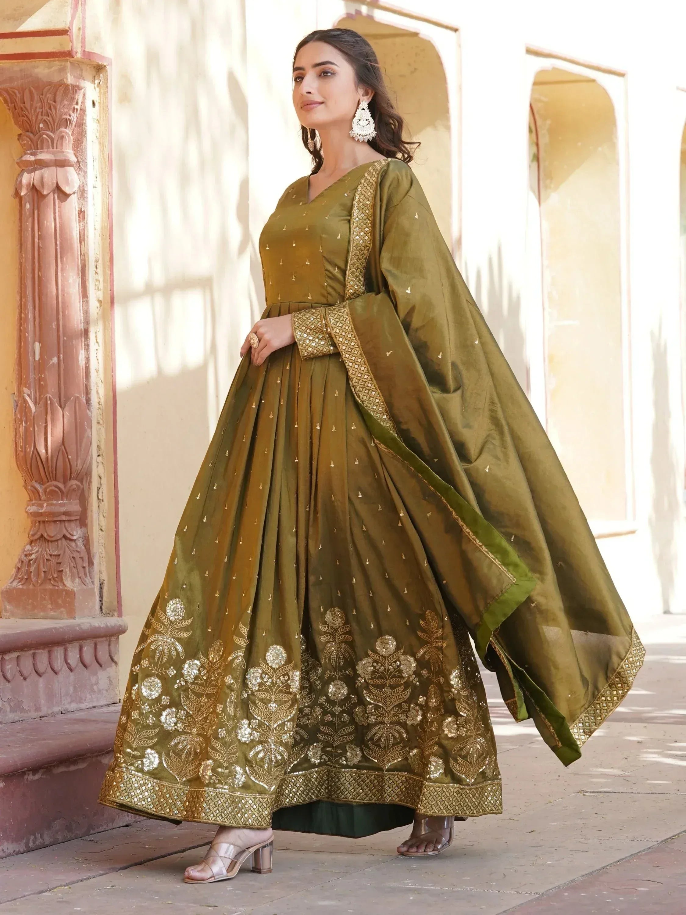 Olive green designer anarkali with gold embroidery, perfect for Indian ethnic wear and festive occasions.