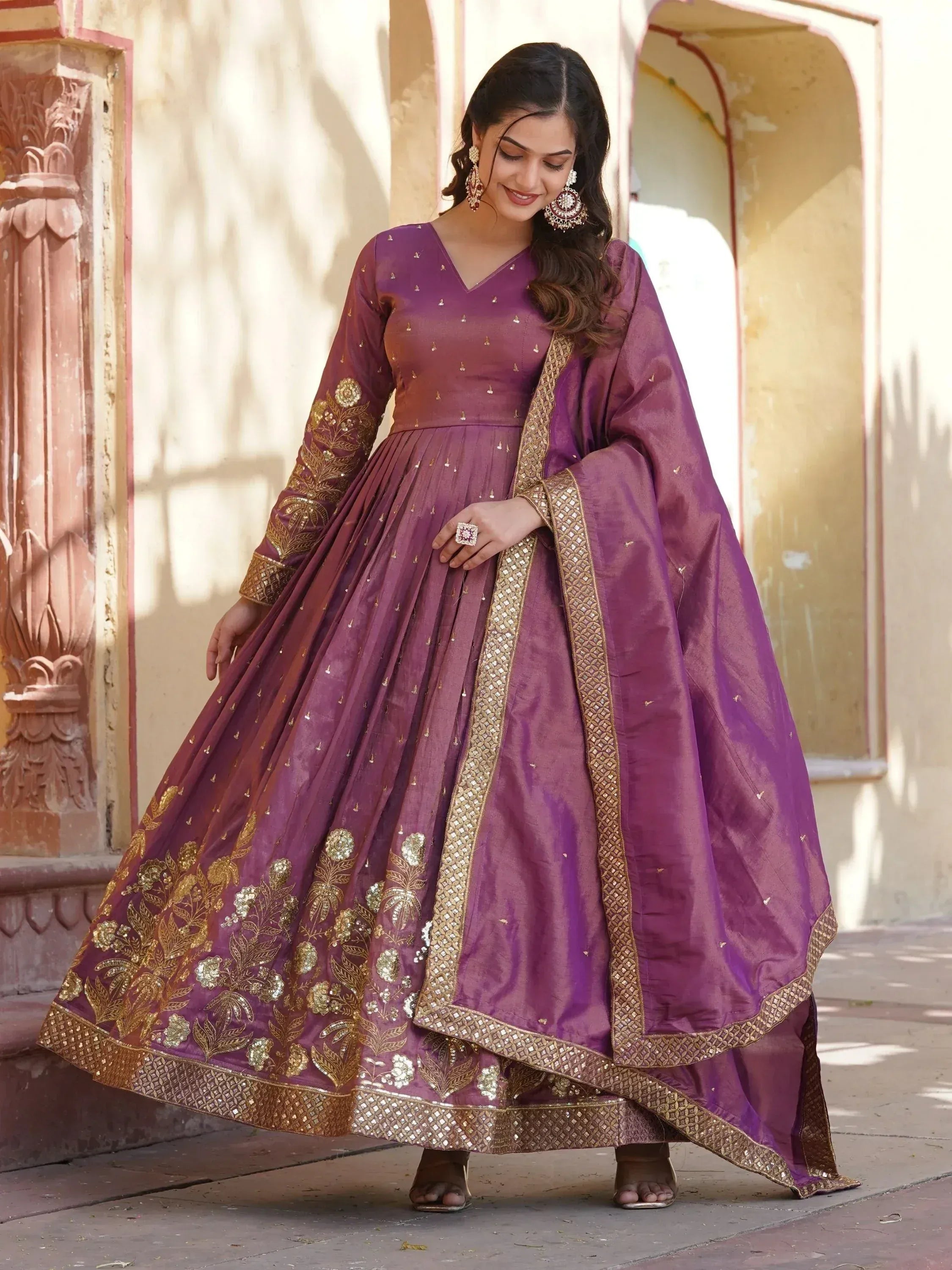 Purple Indian ethnic anarkali suit with gold embroidery, perfect for weddings and festive occasions