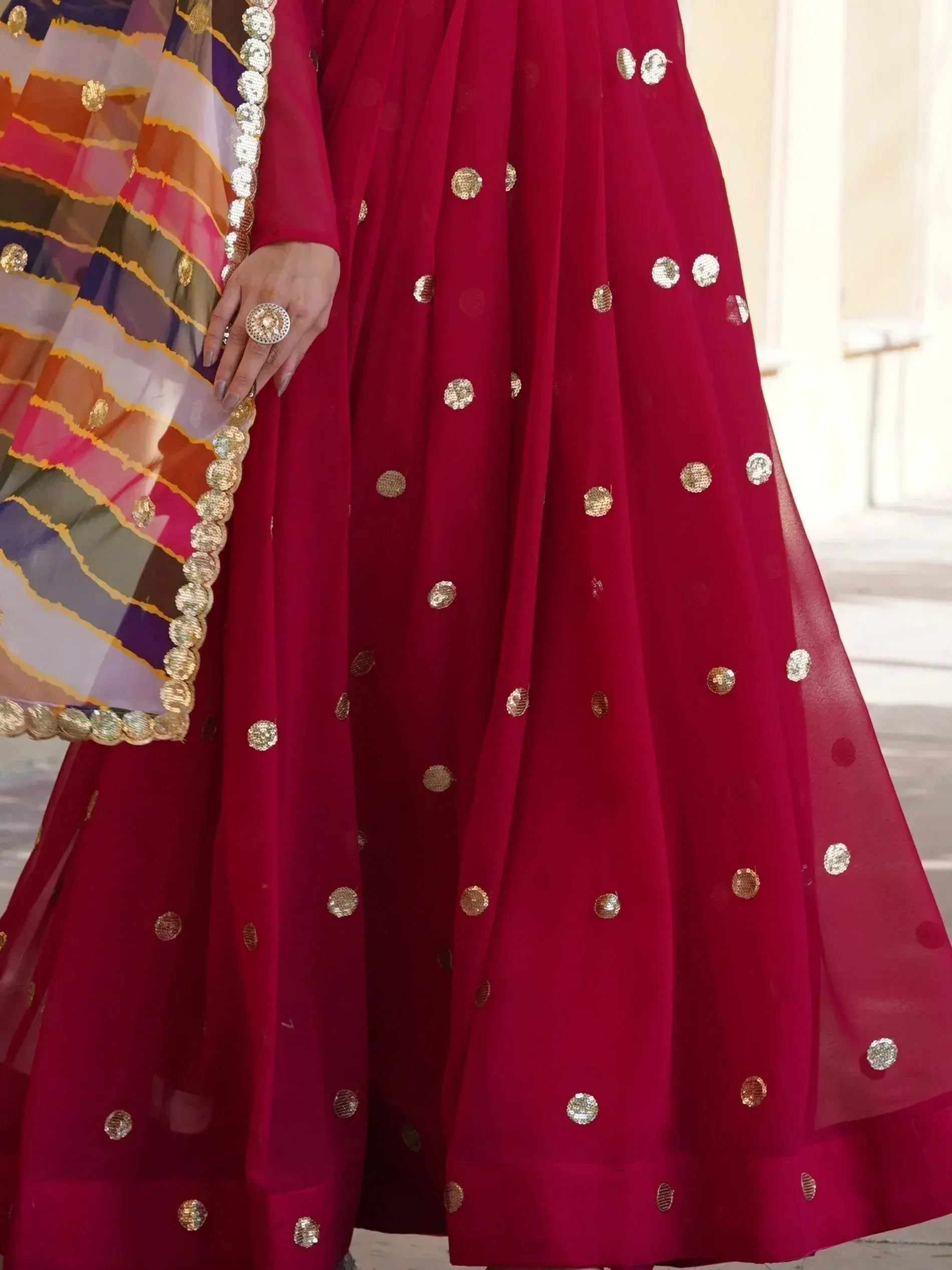 Red lehenga choli with gold sequin embellishments and colorful dupatta, Indian ethnic wear