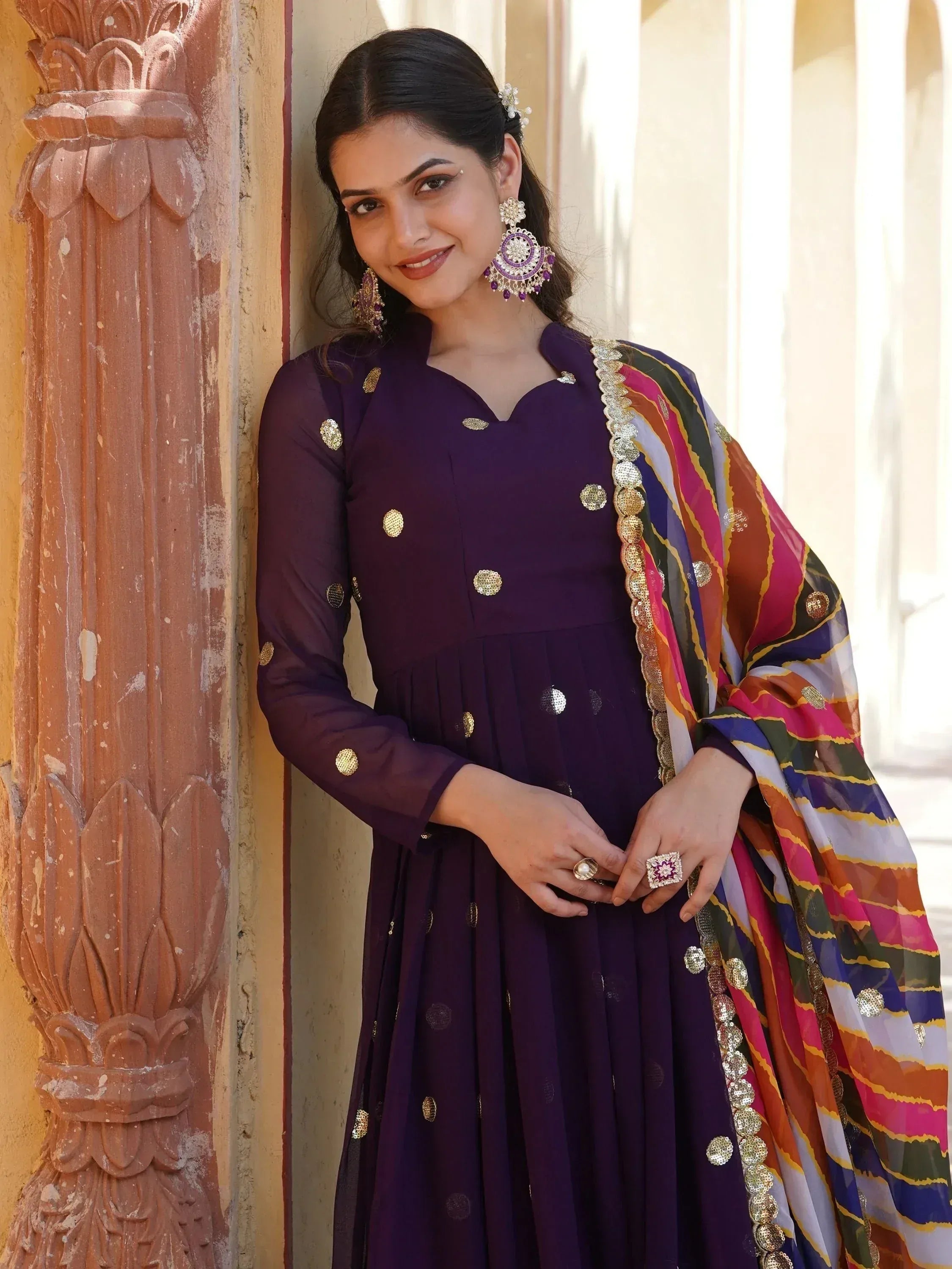 Purple ethnic anarkali with gold embellishments and colorful dupatta, perfect for Indian festive occasions