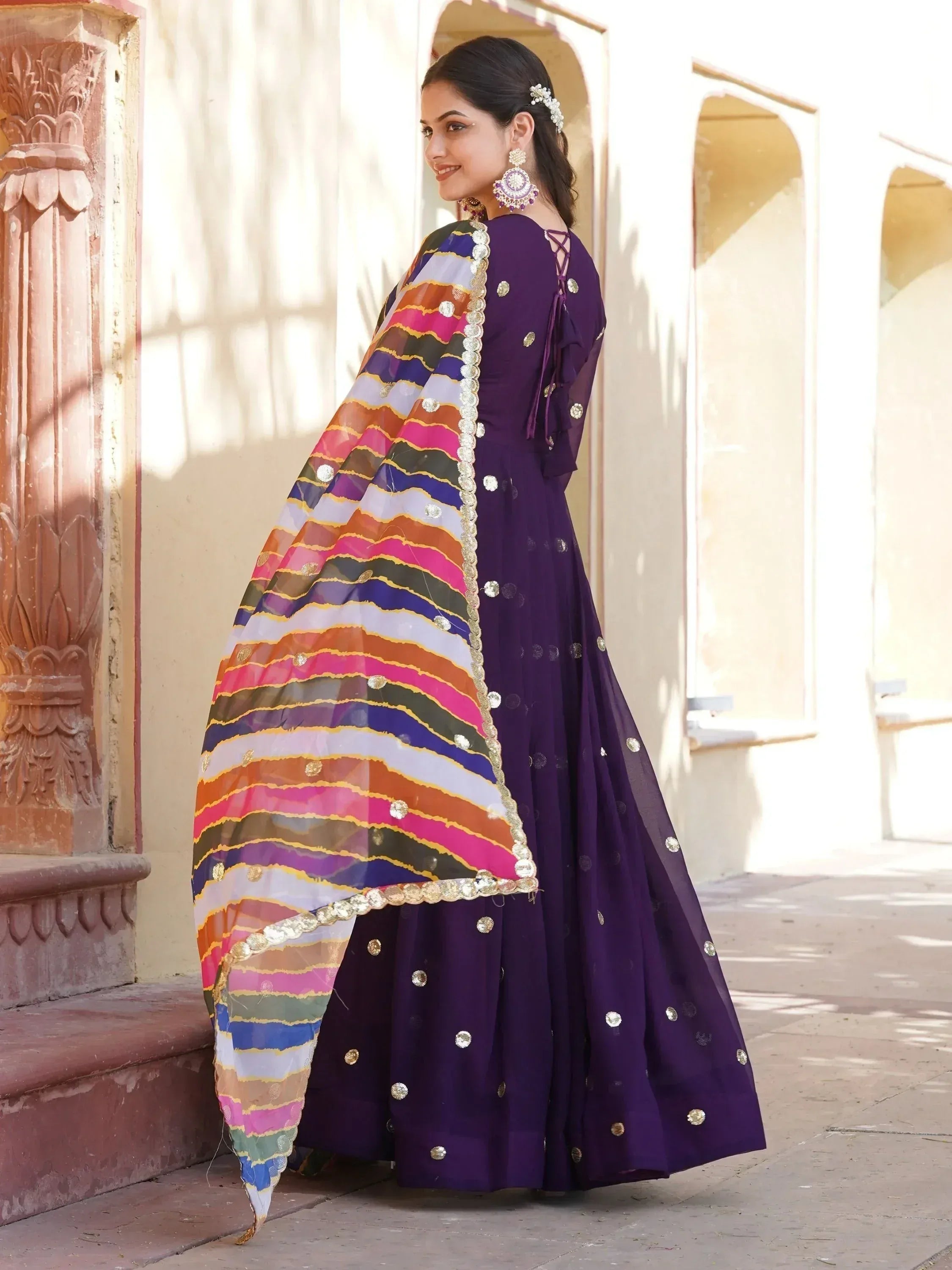 Purple ethnic anarkali with colorful striped dupatta, perfect for Indian festivals and weddings