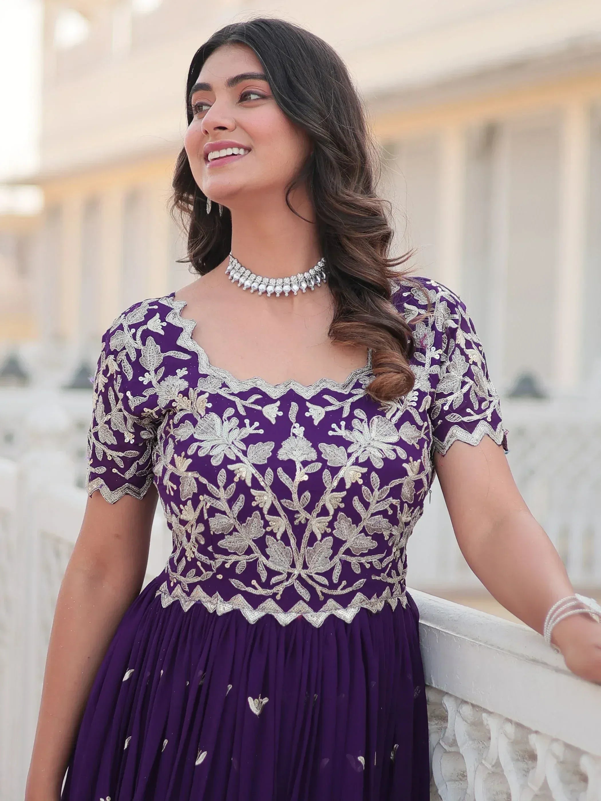 Purple ethnic gown with silver floral embroidery, perfect for Indian weddings and parties